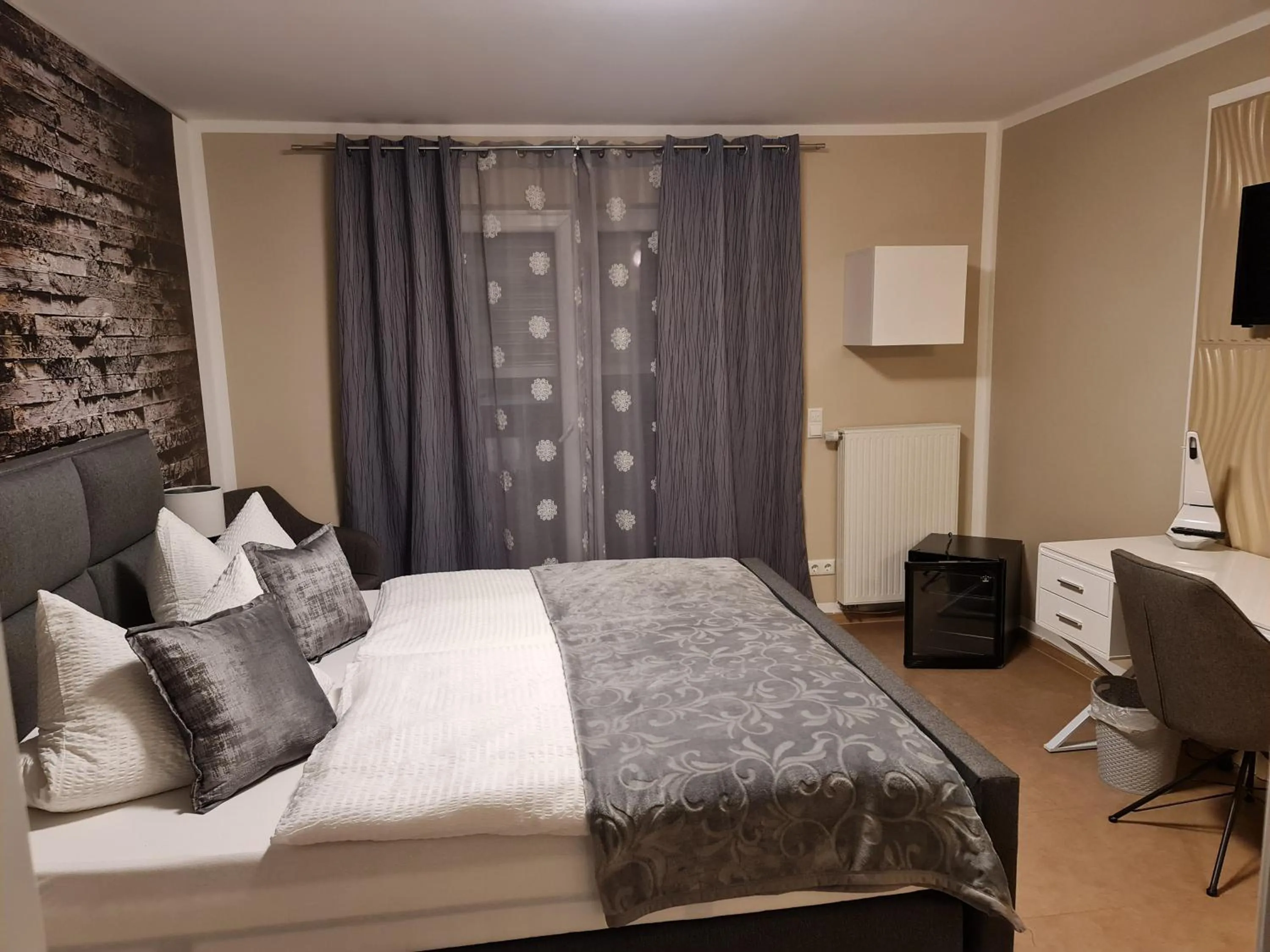 Bed in Aparthotel Magnolia