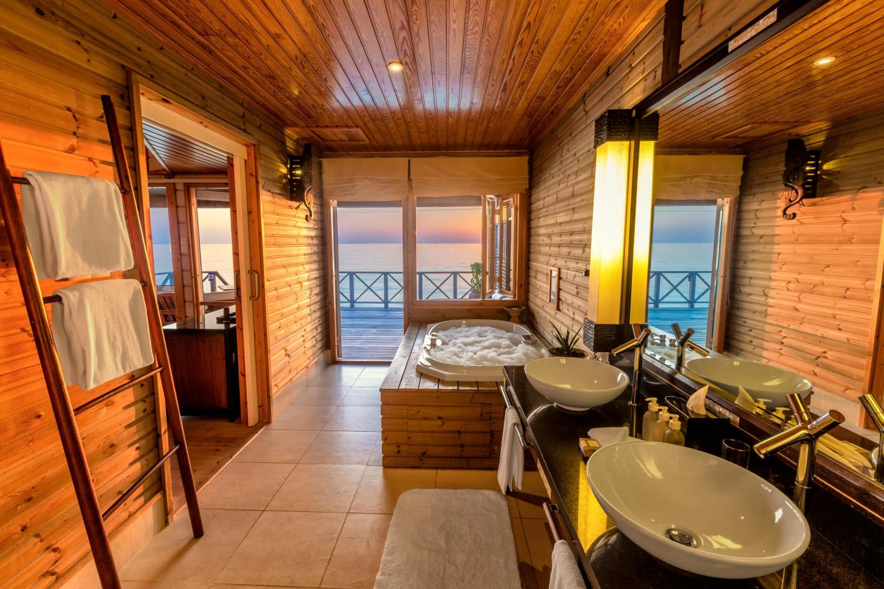 Bathroom, Bed in Komandoo Island Resort & Spa
