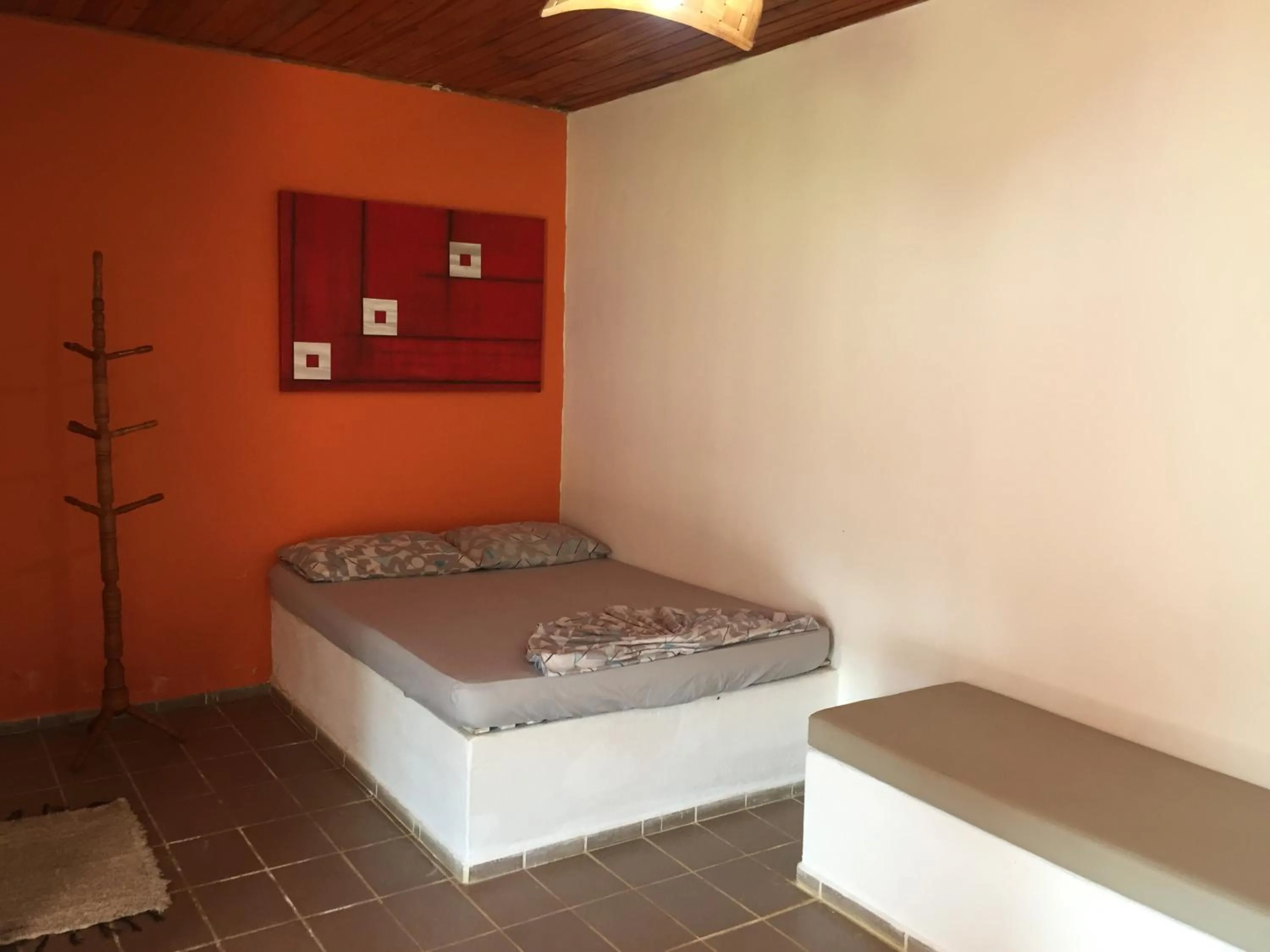 Property building, Bed in Pousada Ecológica Cavalo de Pedra