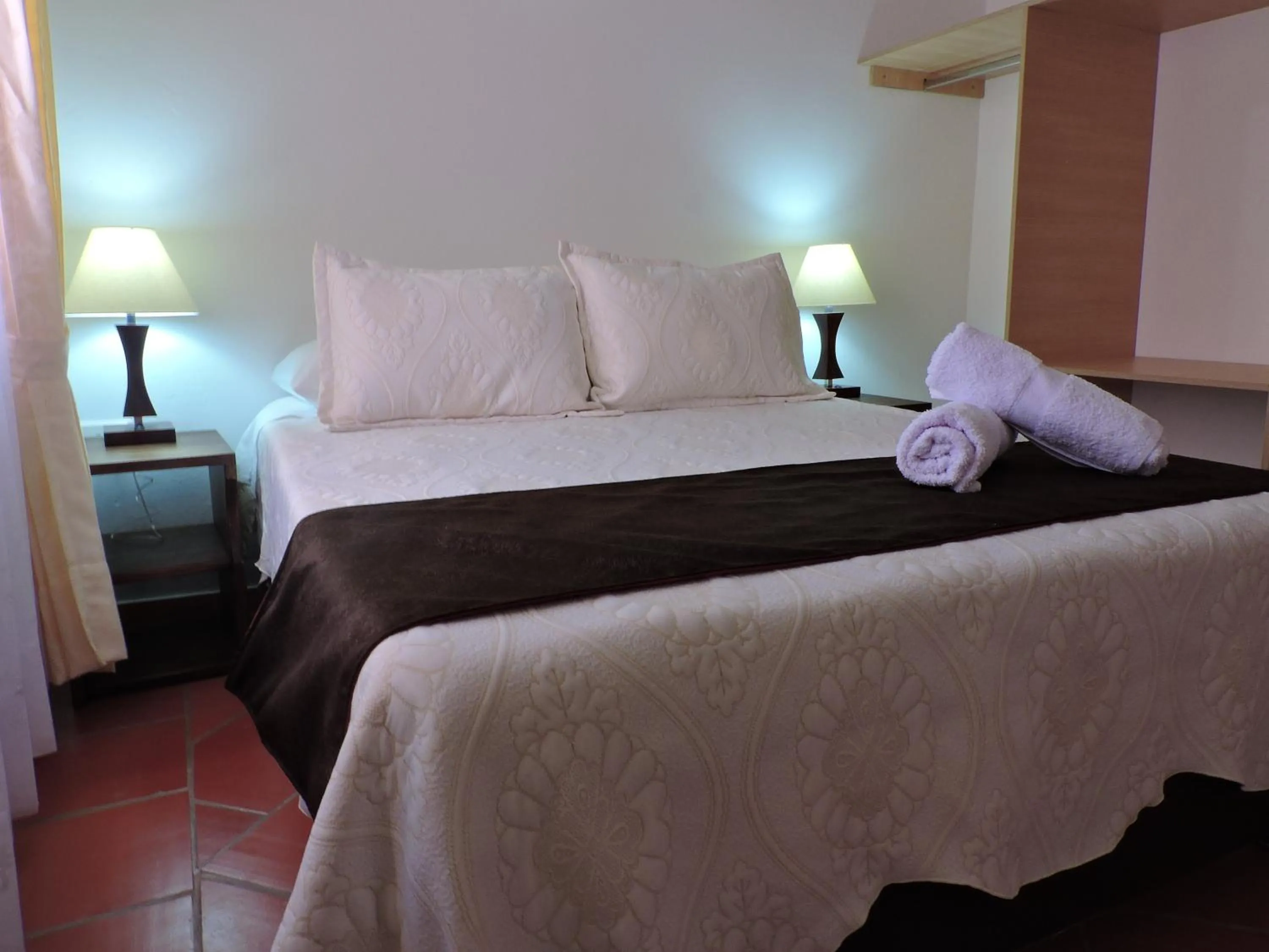 Bedroom, Bed in Apartahotel La Gran Familia
