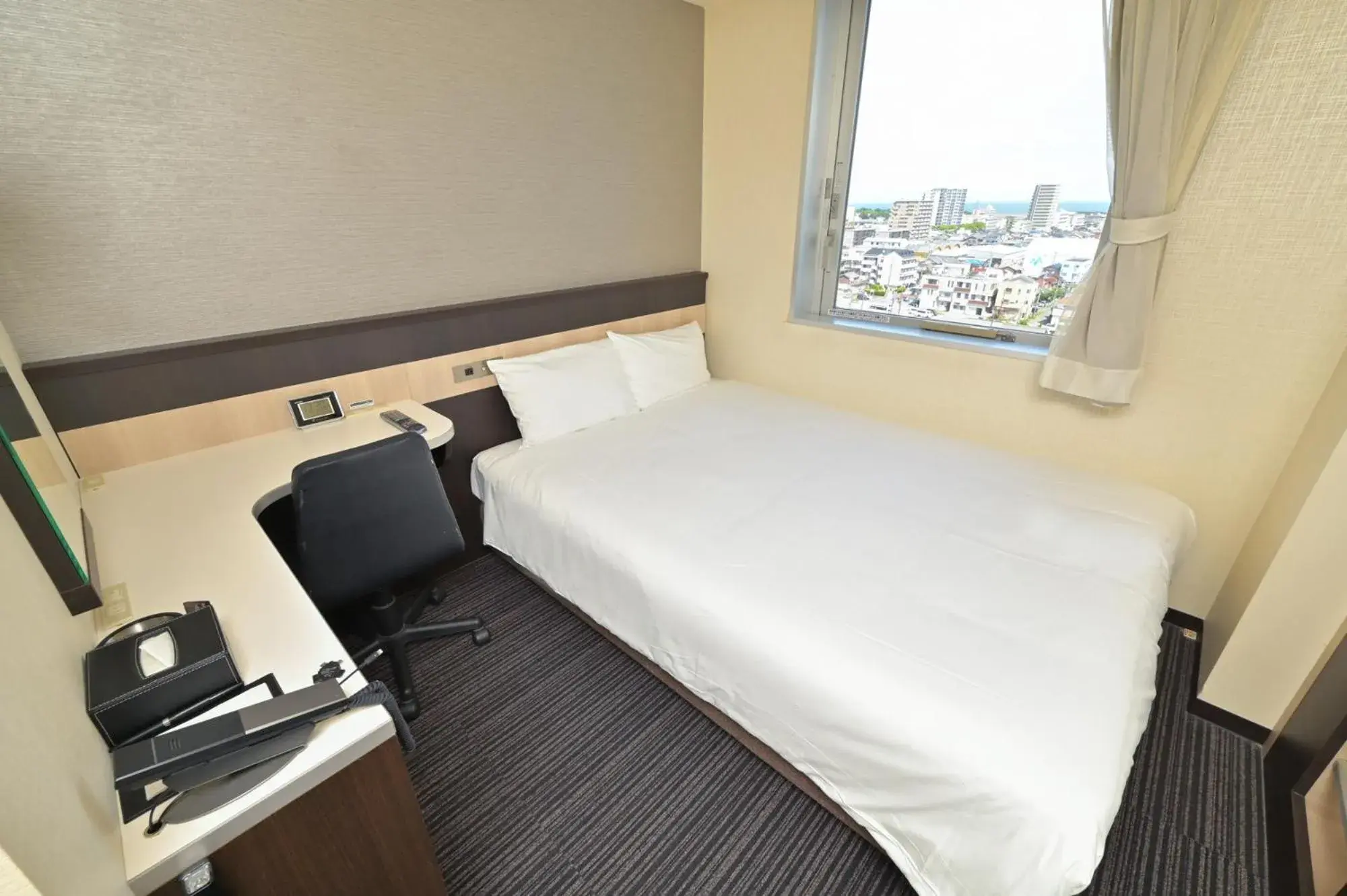 Photo of the whole room, Bed in Sanco Inn Tsu Ekimae Photo of the whole room, Bed in Sanco Inn Tsu Ekimae