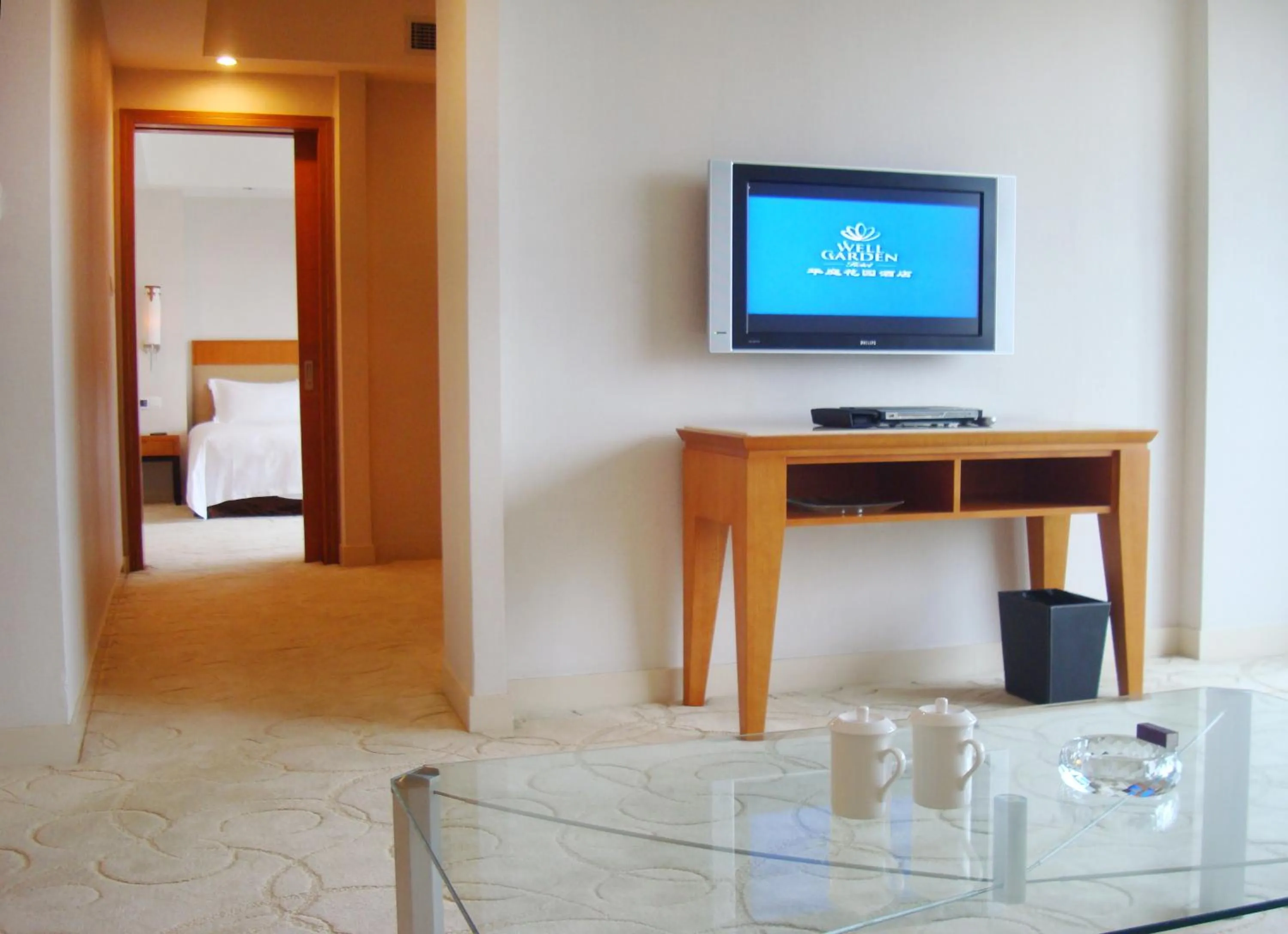 Communal lounge/ TV room in Dongguan Well Garden Hotel