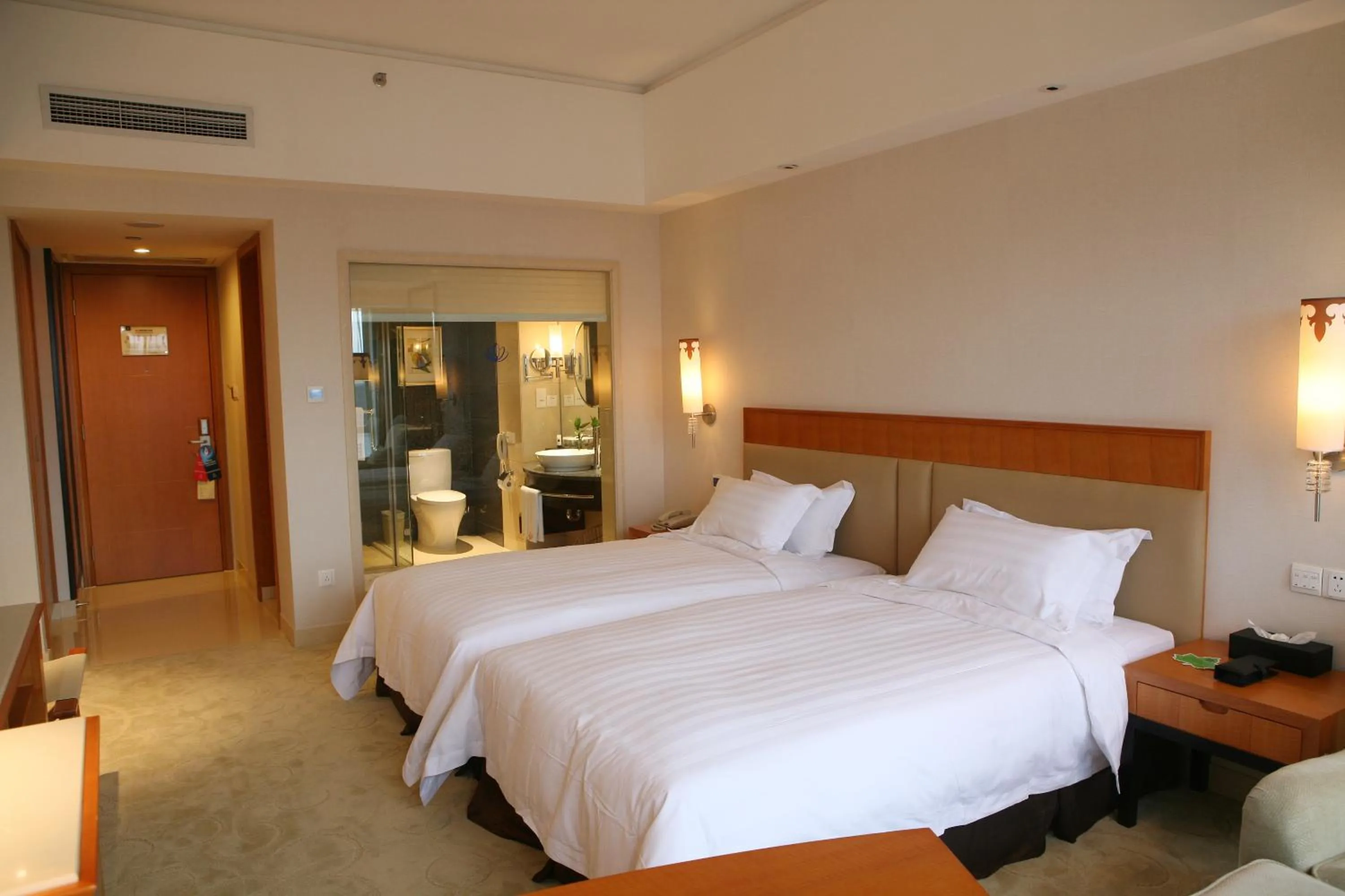 Bed in Dongguan Well Garden Hotel
