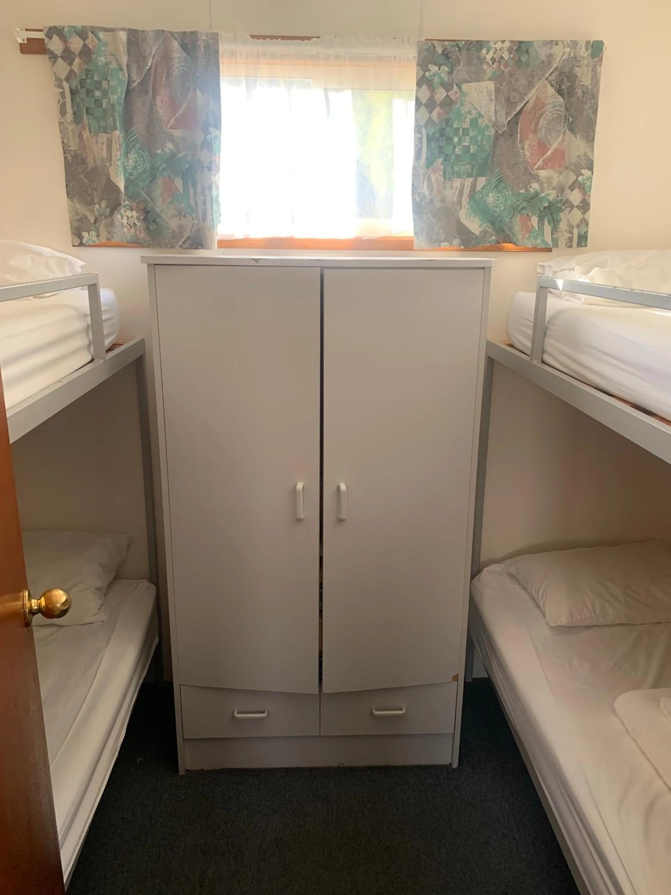 Bed in Miner's Retreat Motel