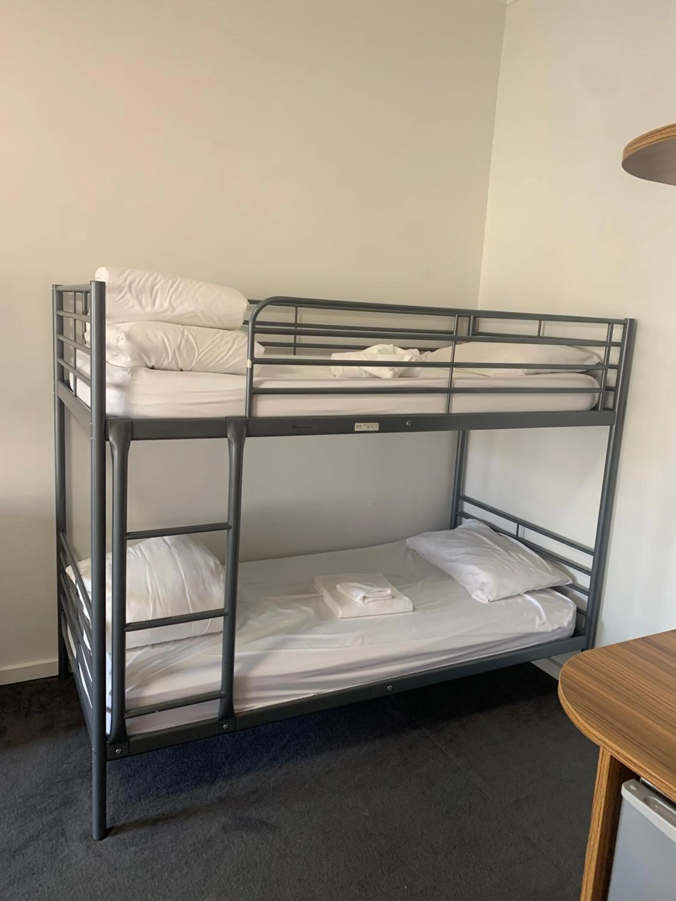 Bed in Miner's Retreat Motel
