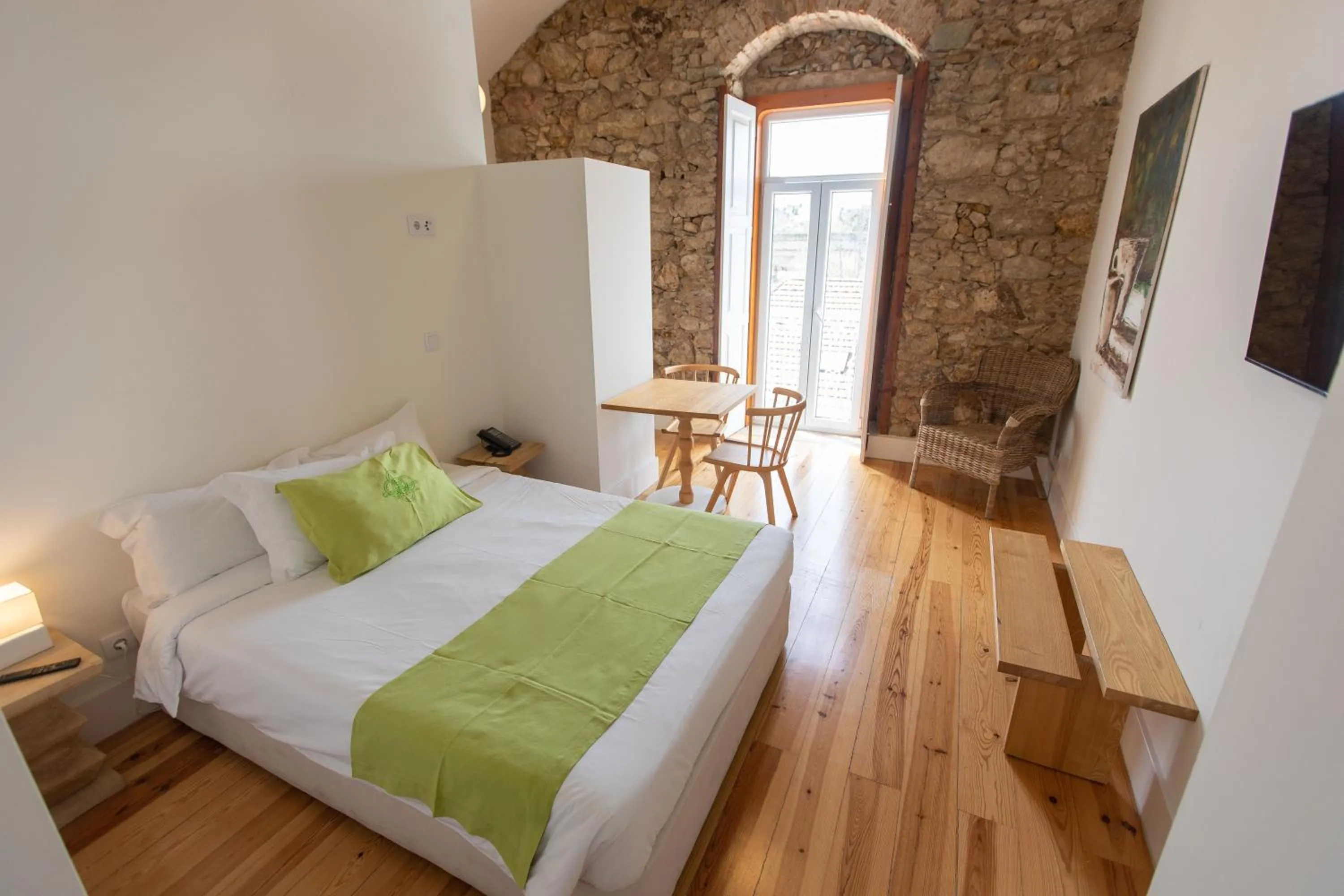 Bed in Casa de São Bento by PURUS