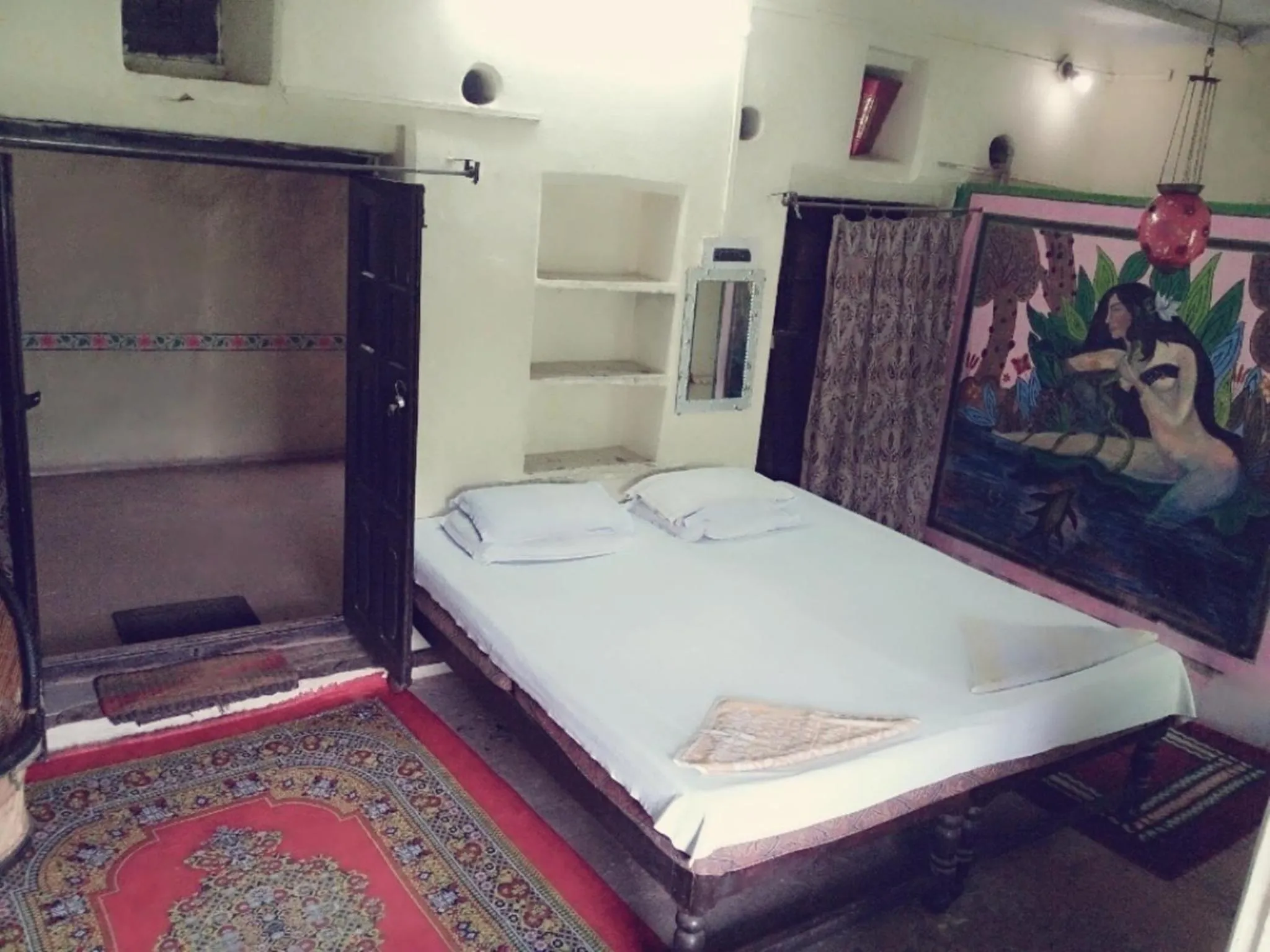 Bed in Haveli Uma Megh Tourist Guest House