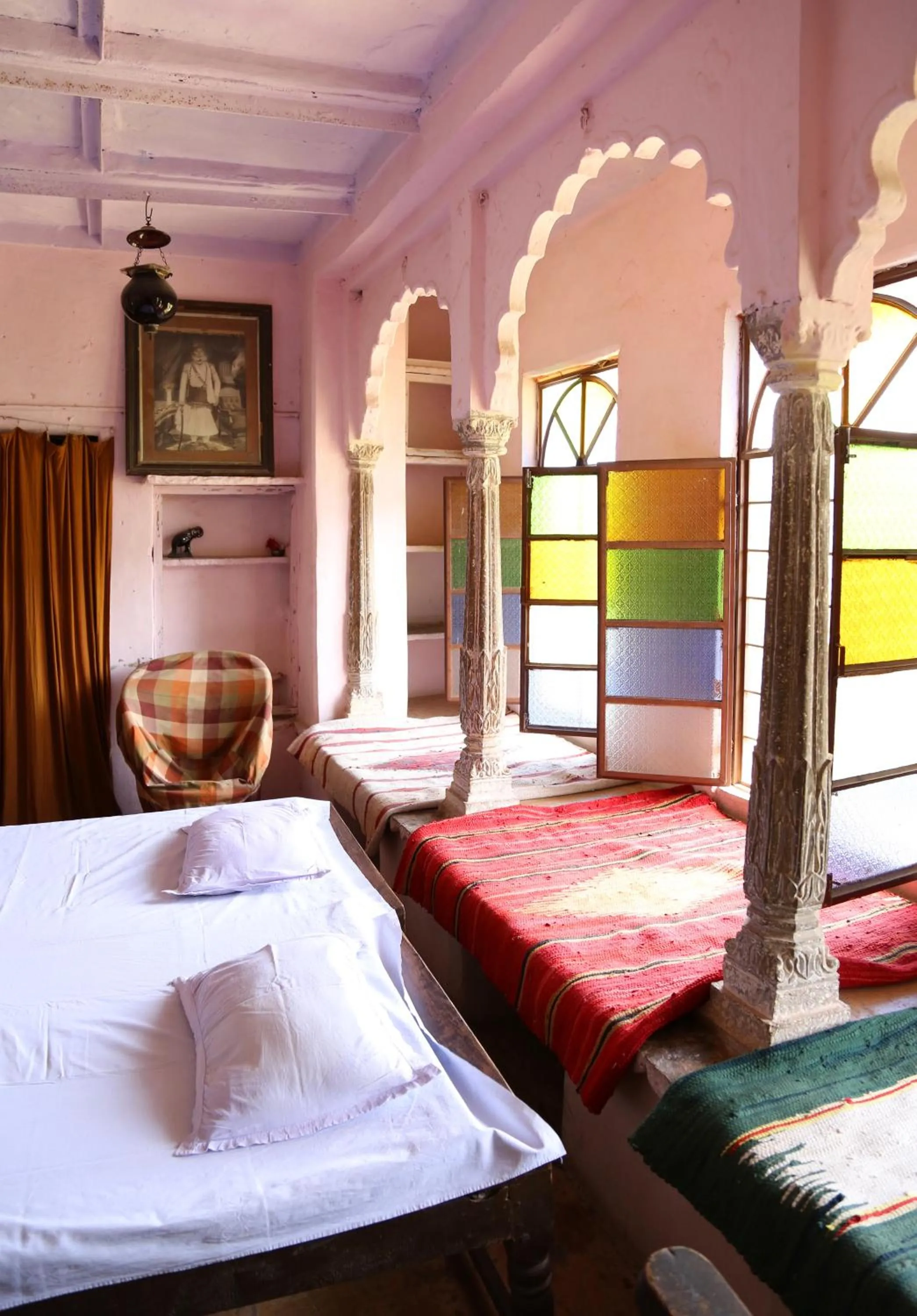 Bed in Haveli Uma Megh Tourist Guest House