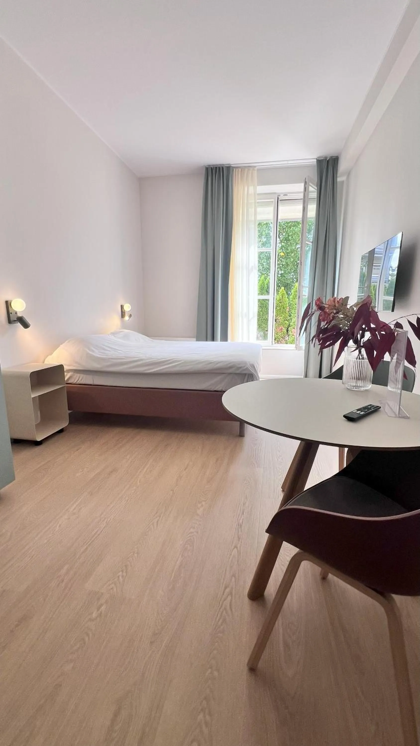 Bed in Key Inn Appart Hotel Belair