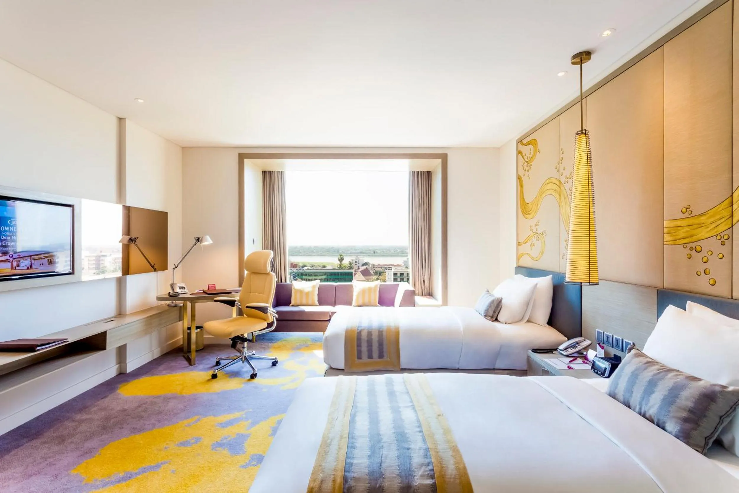 Photo of the whole room, Bed in Crowne Plaza Vientiane by IHG