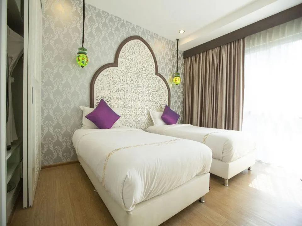 Bed in The Grand Morocc Hotel