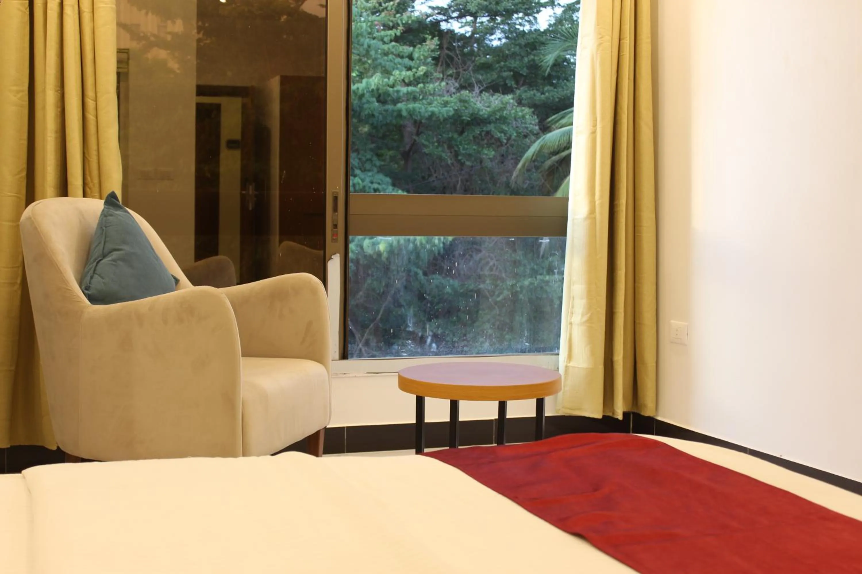 Seating area, Bed in Hotel Belle Vie