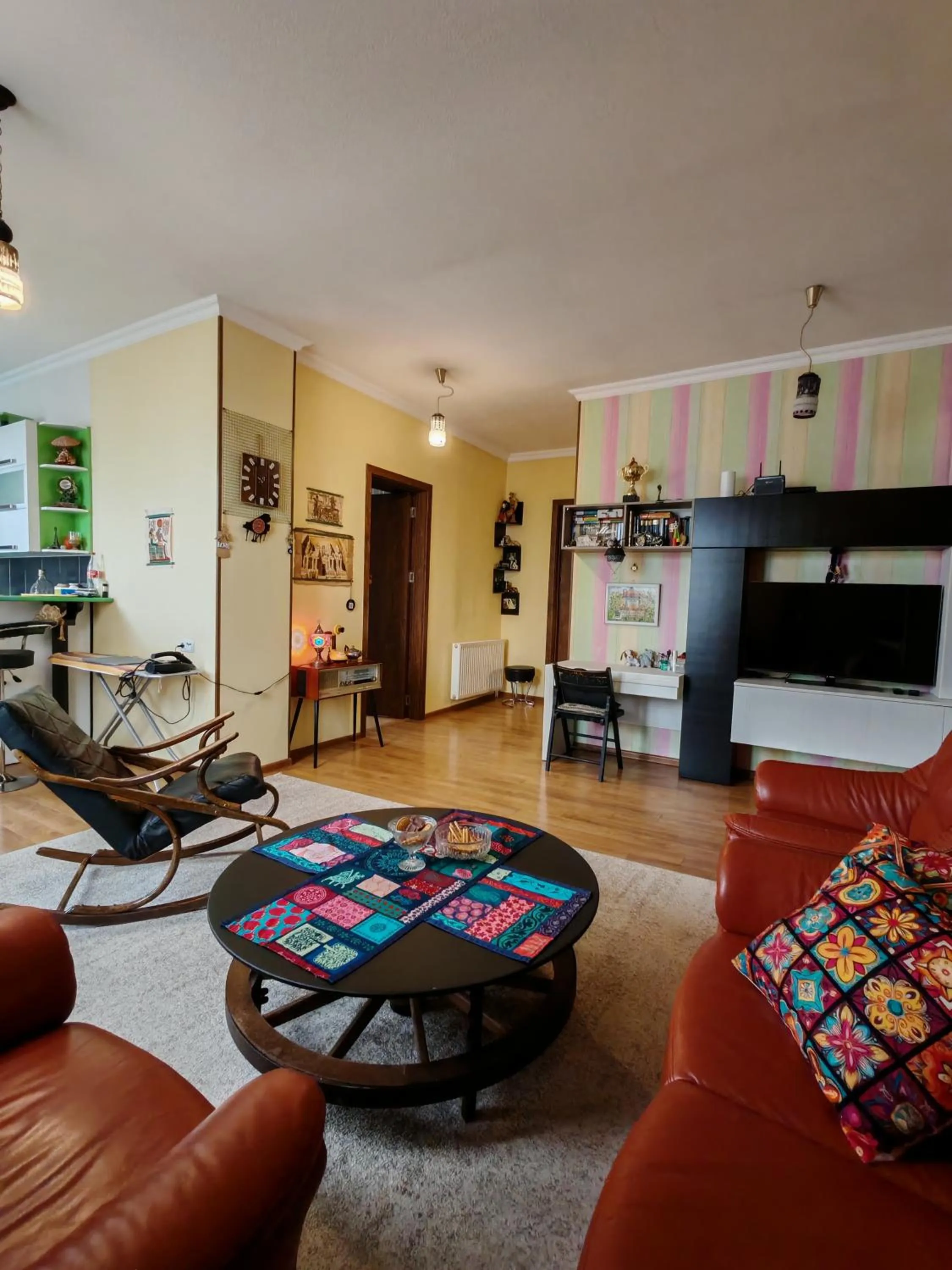 Communal lounge/ TV room in Qilimcha's Guesthouse-Art Museum