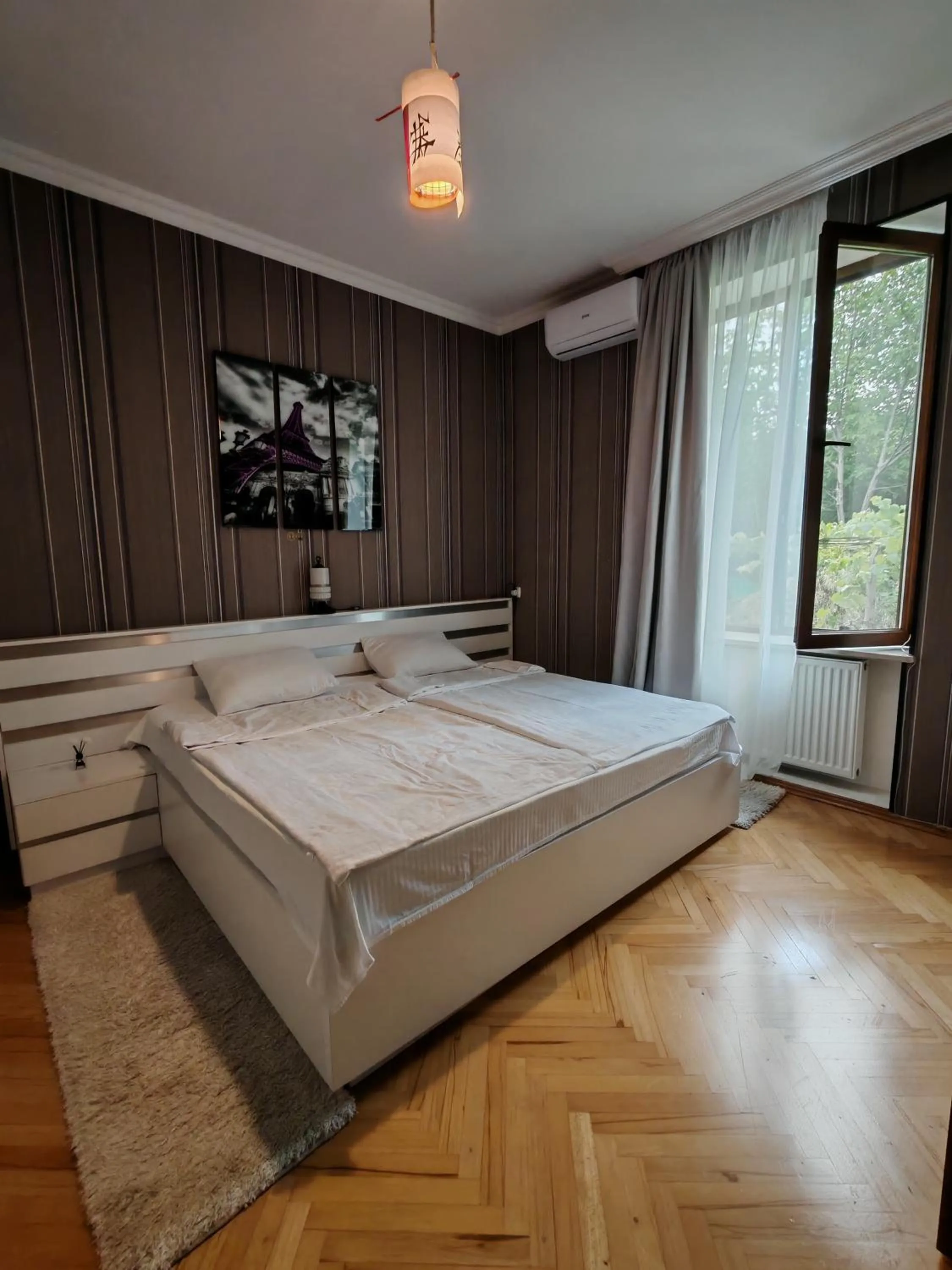 Bed in Qilimcha's Guesthouse-Art Museum