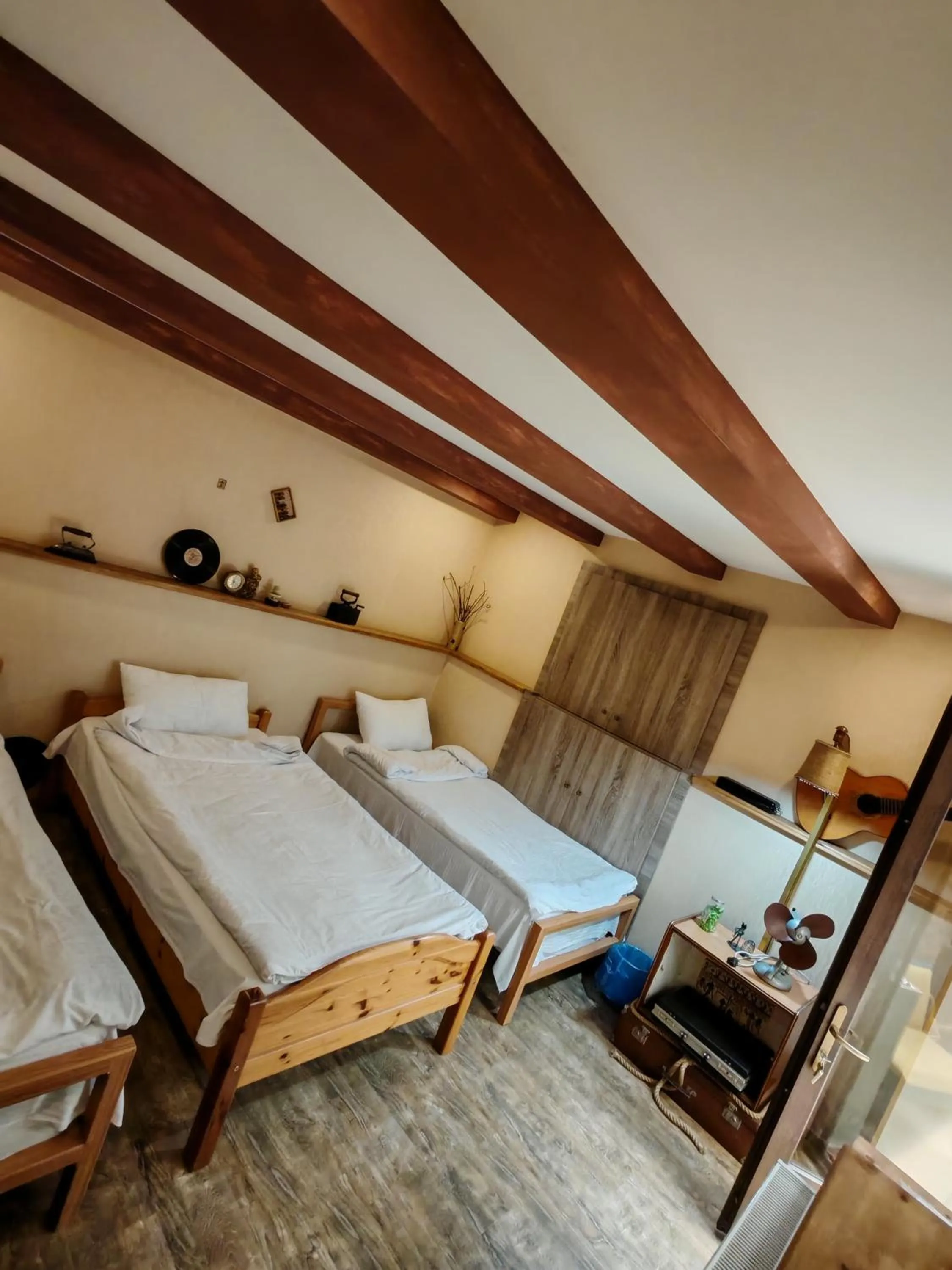 Bed in Qilimcha's Guesthouse-Art Museum