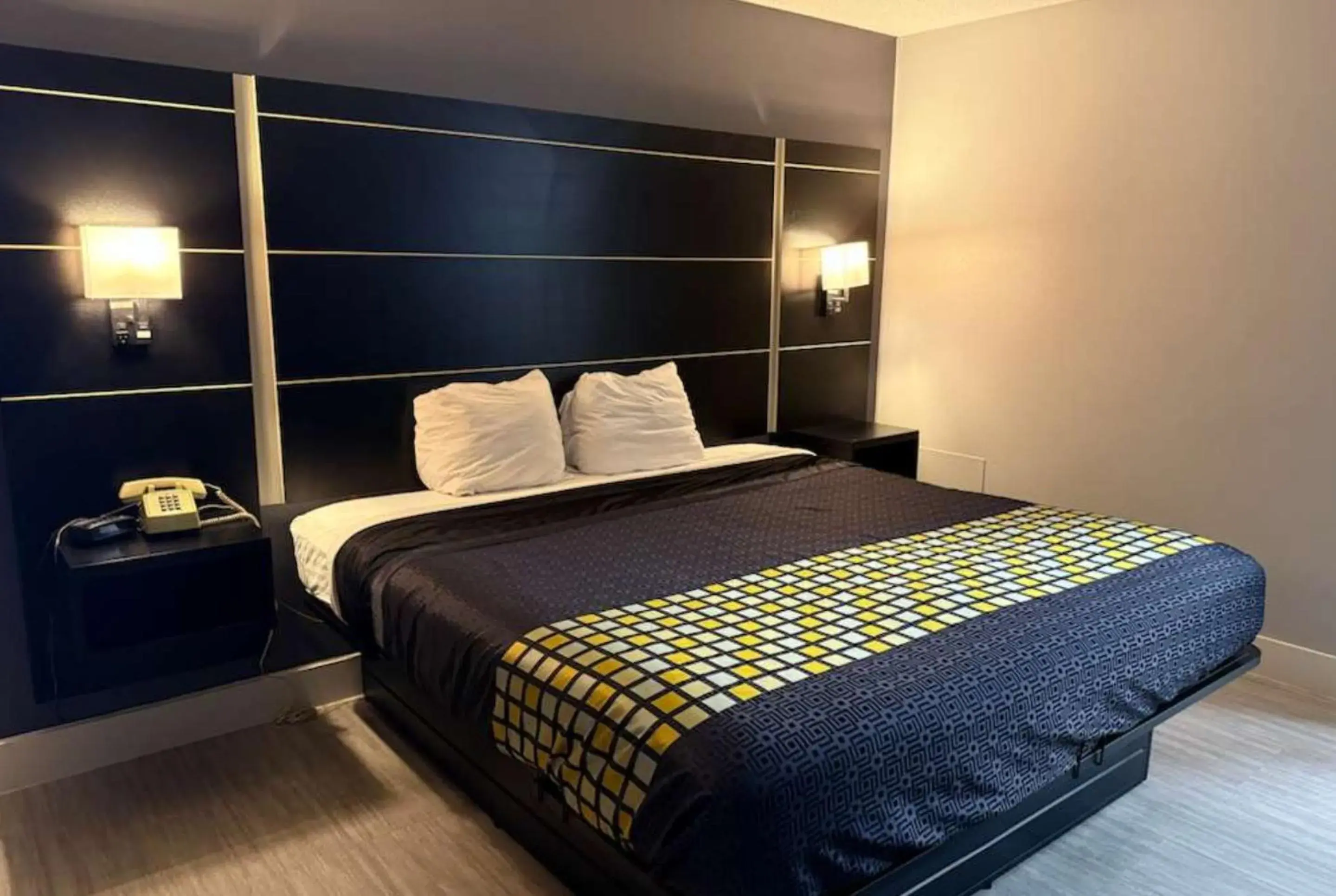 Bed in Coratel Inn & Suites by Jasper Hastings Bed in Coratel Inn & Suites by Jasper Hastings