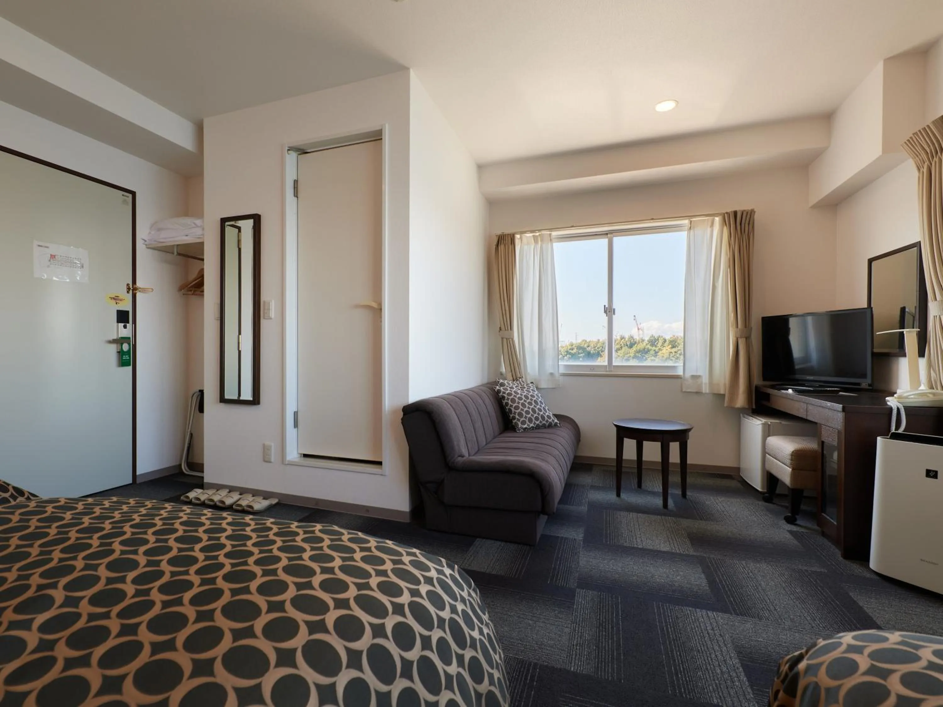 Photo of the whole room, Bed in Wind City Hotel