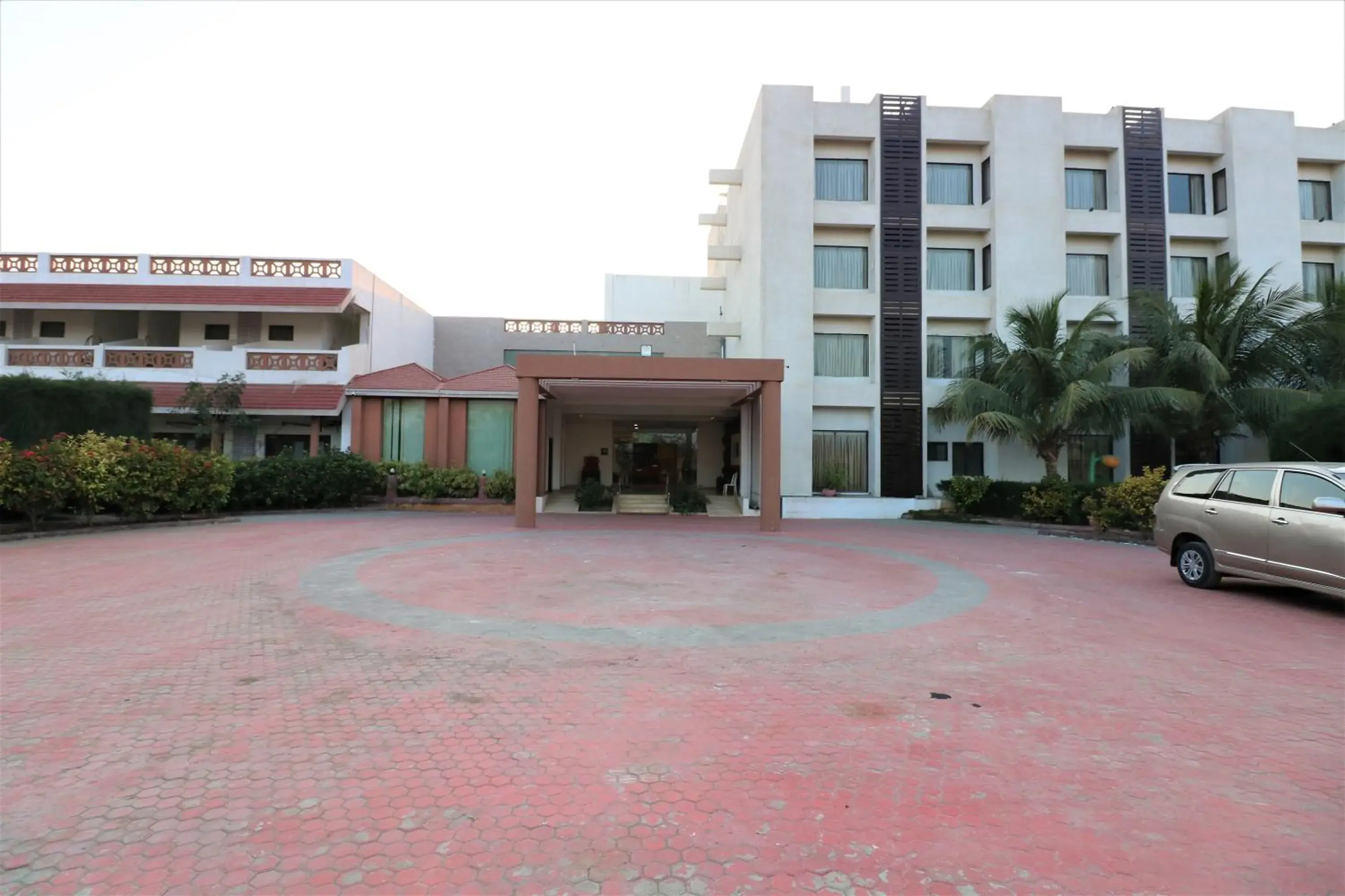 Property building in Goverdhan Greens Resort Dwarka l Hotels In Dwarka Property building in Goverdhan Greens Resort Dwarka l Hotels In Dwarka