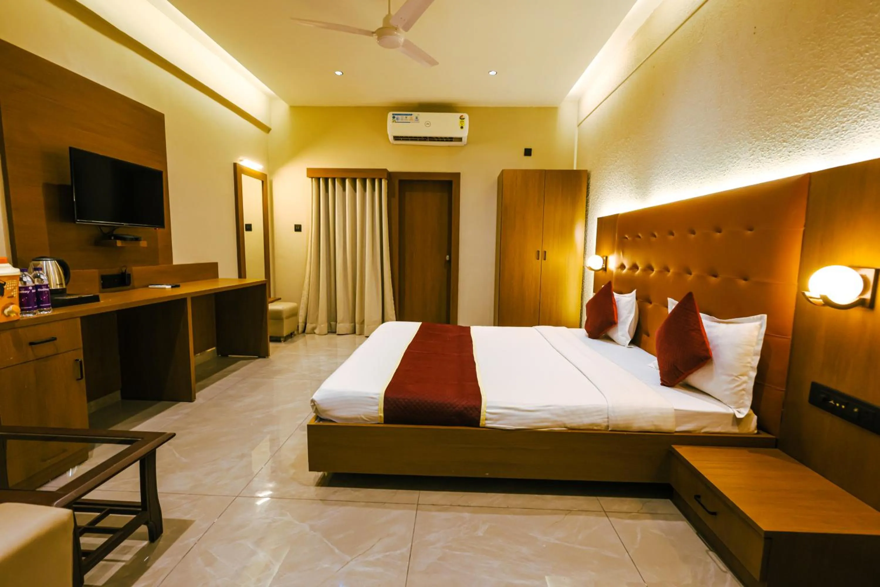 Bedroom, Bed in Goverdhan Greens Resort Dwarka l Hotels In Dwarka