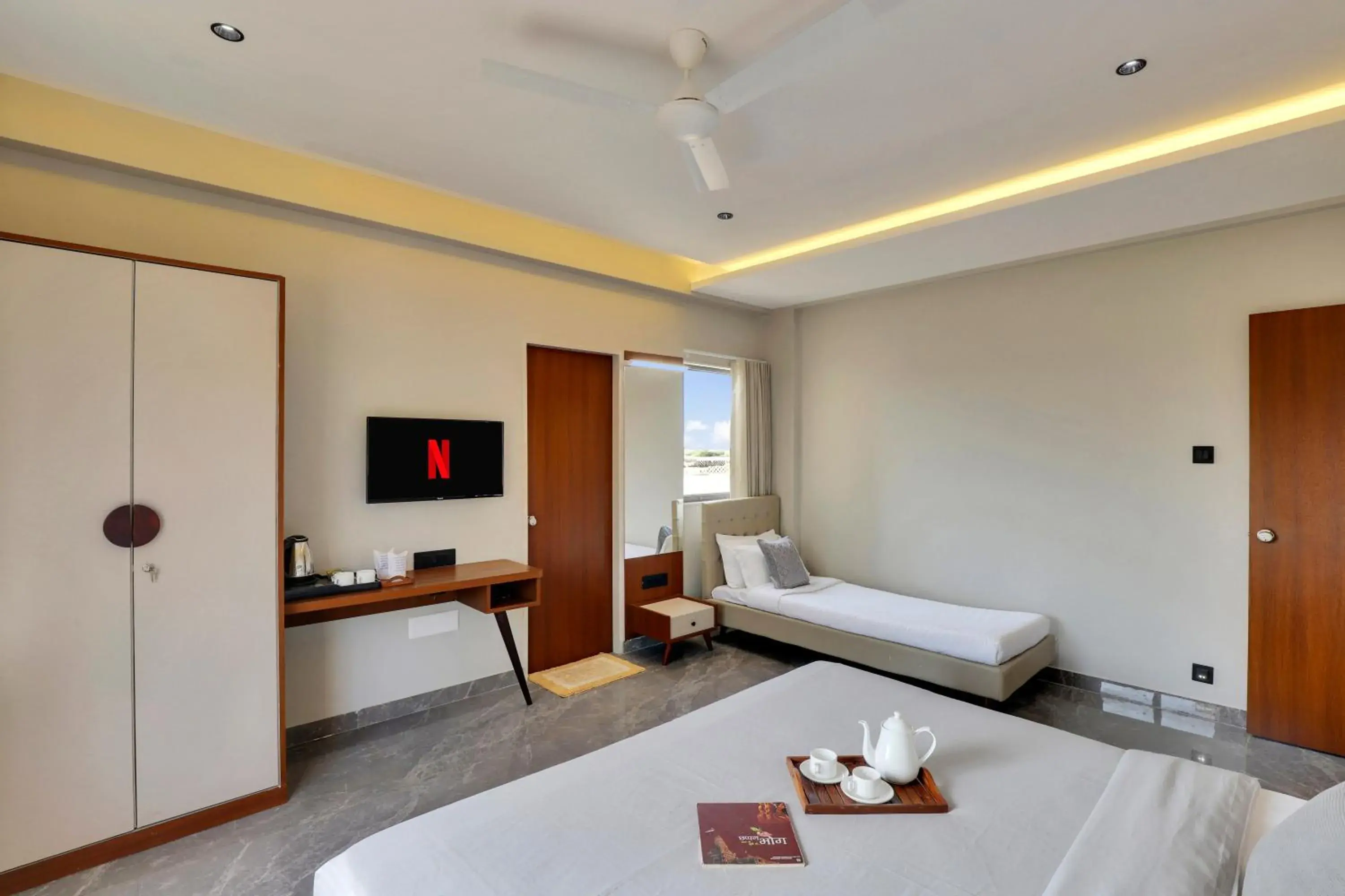 Photo of the whole room, Bed in Goverdhan Greens Resort Dwarka l Hotels In Dwarka Photo of the whole room, Bed in Goverdhan Greens Resort Dwarka l Hotels In Dwarka