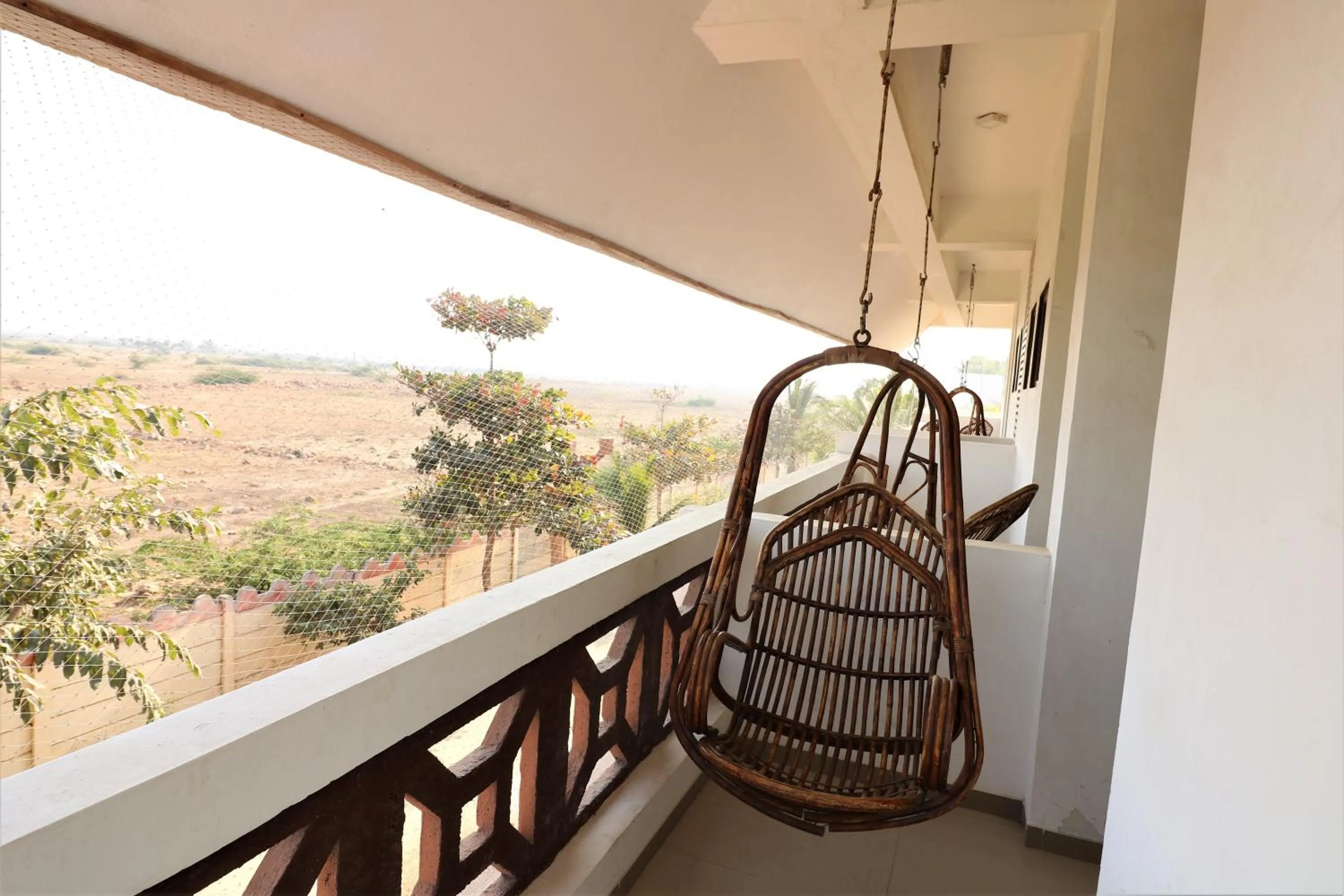 Balcony/Terrace in Goverdhan Greens Resort Dwarka l Hotels In Dwarka