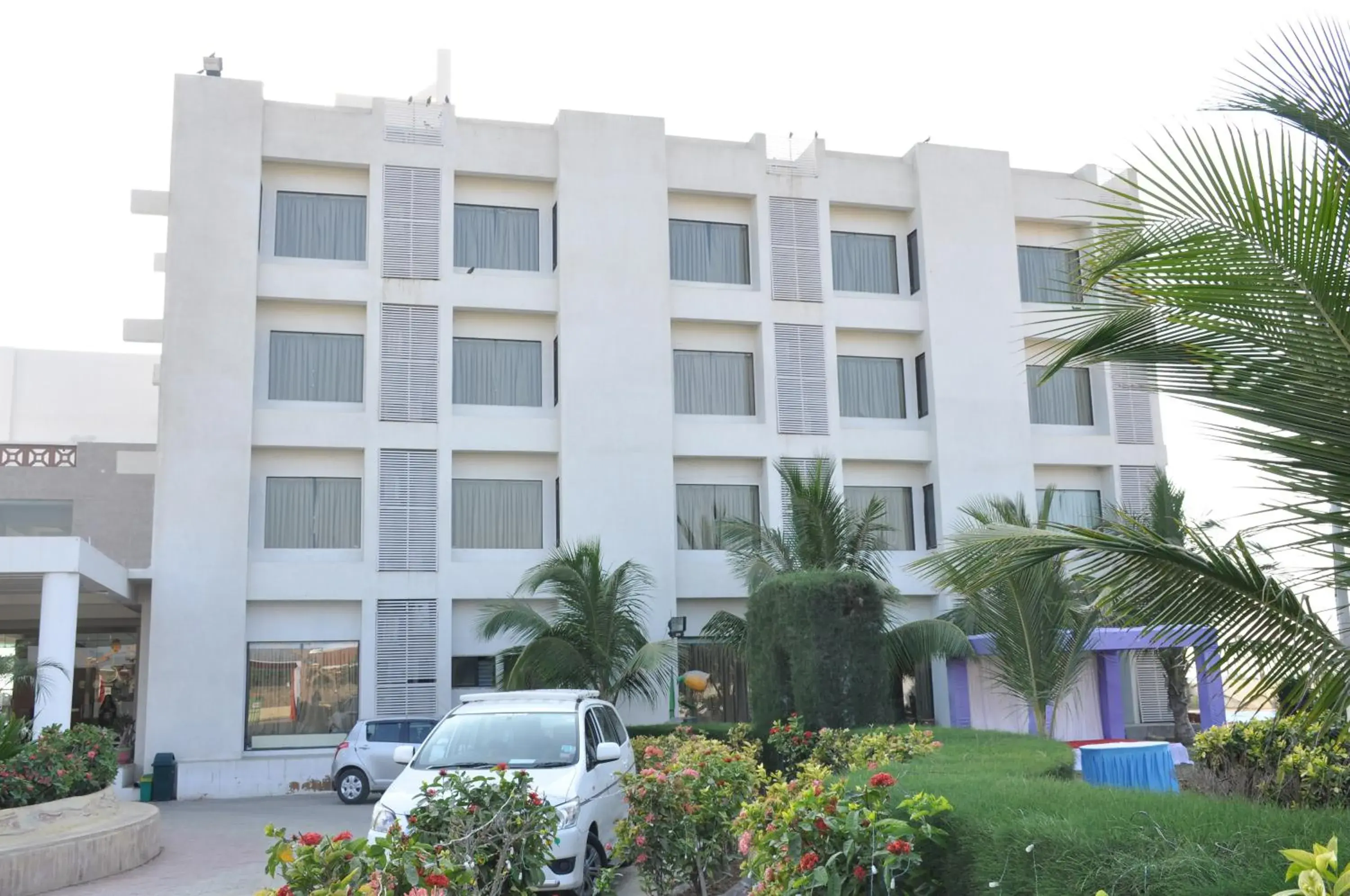 Property building in Goverdhan Greens Resort Dwarka l Hotels In Dwarka Property building in Goverdhan Greens Resort Dwarka l Hotels In Dwarka