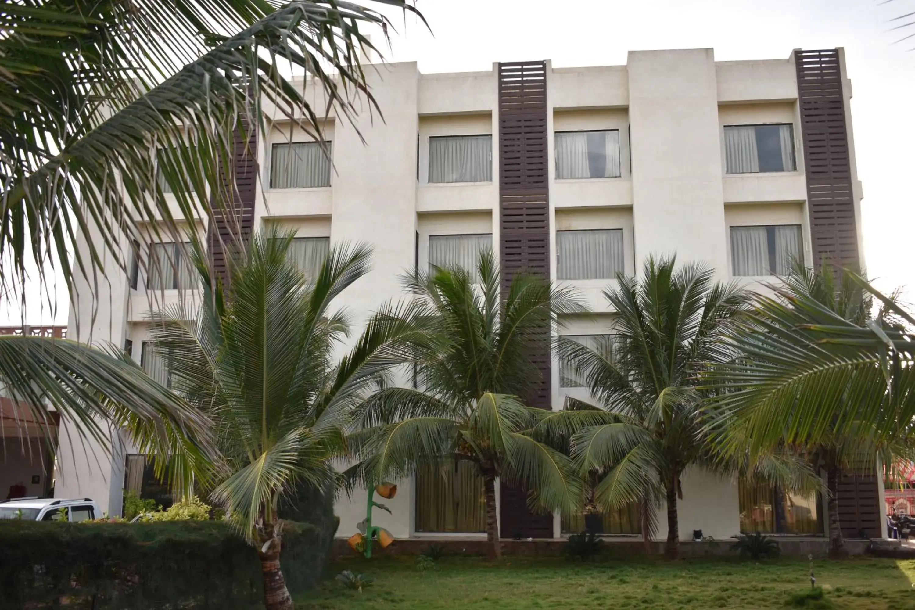 Property building in Goverdhan Greens Resort Dwarka l Hotels In Dwarka Property building in Goverdhan Greens Resort Dwarka l Hotels In Dwarka