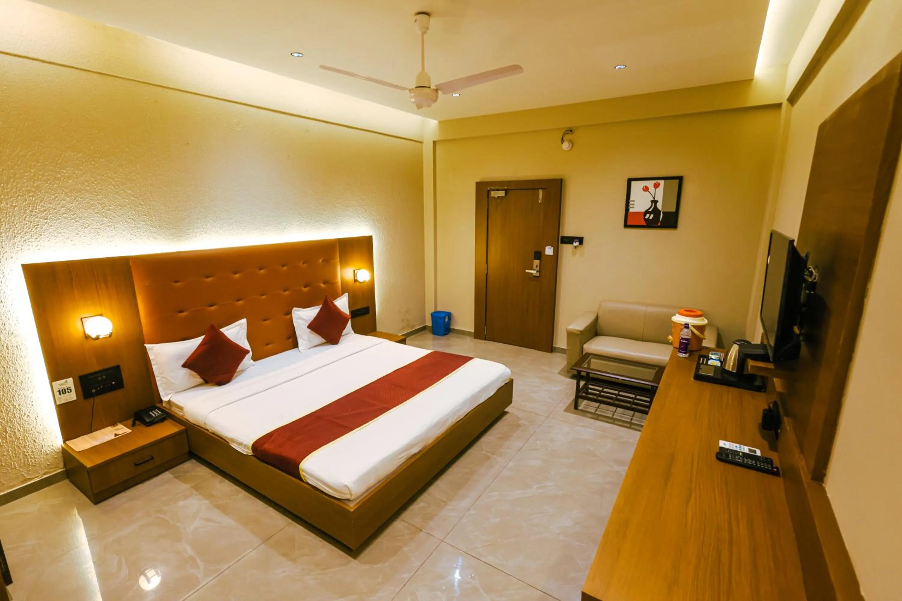 Bedroom, Bed in Goverdhan Greens Resort Dwarka l Hotels In Dwarka