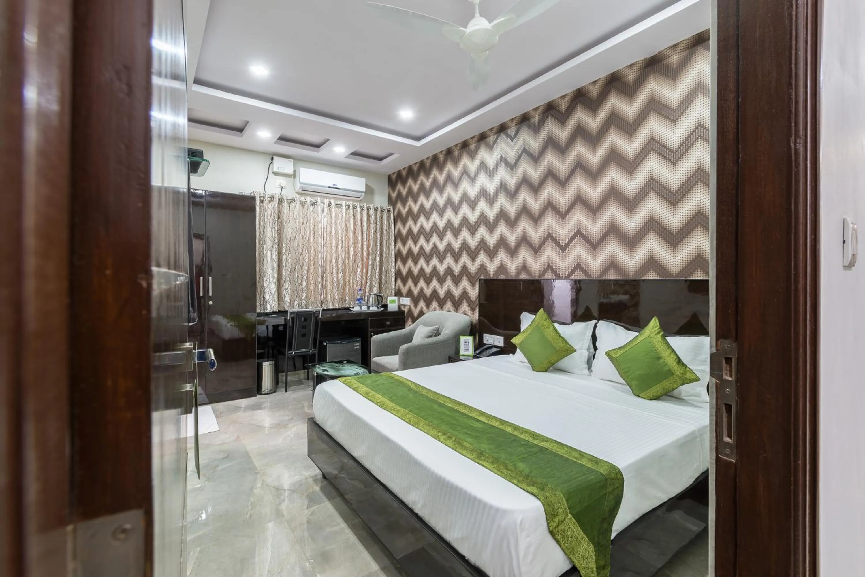 Bed in Treebo Greenwood Premier Suites, Old Airport Road