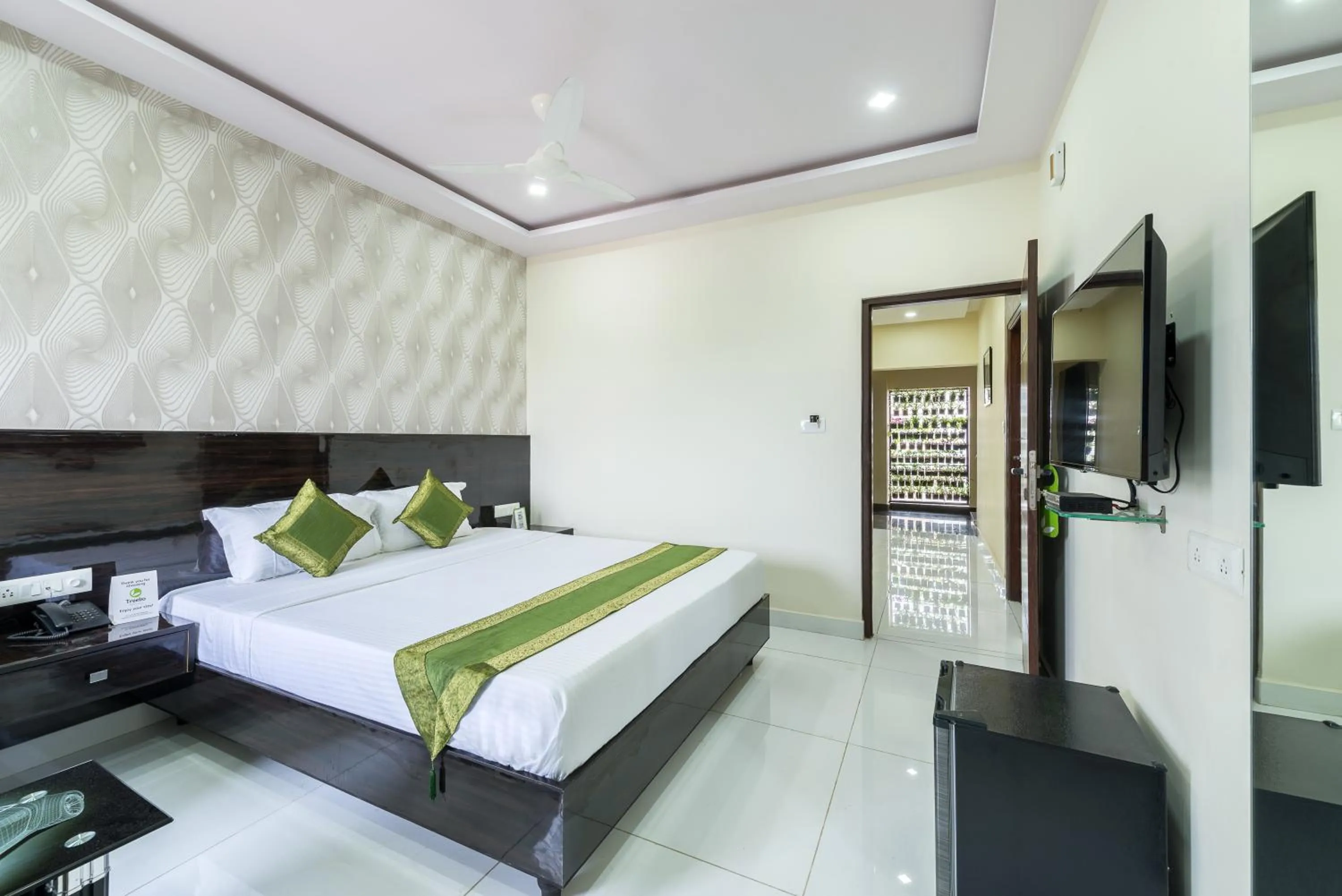 Bed in Treebo Greenwood Premier Suites, Old Airport Road