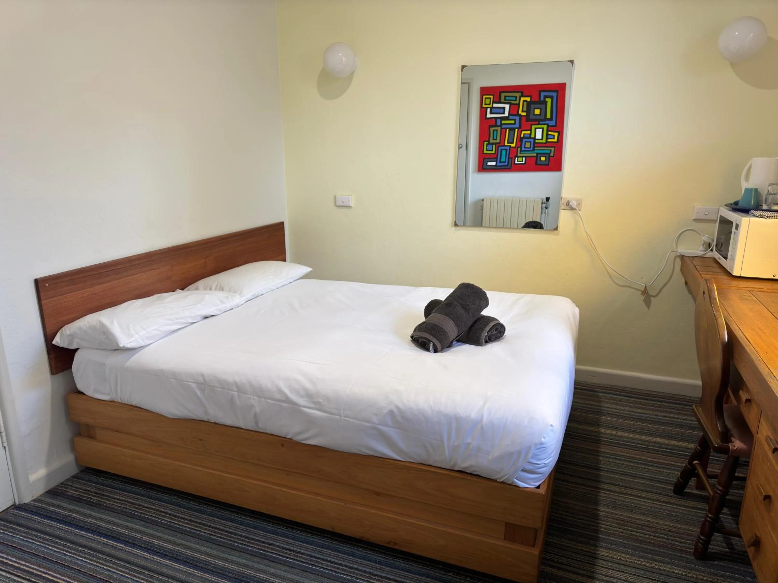 Bed in Bunkhouse Motel Cooma