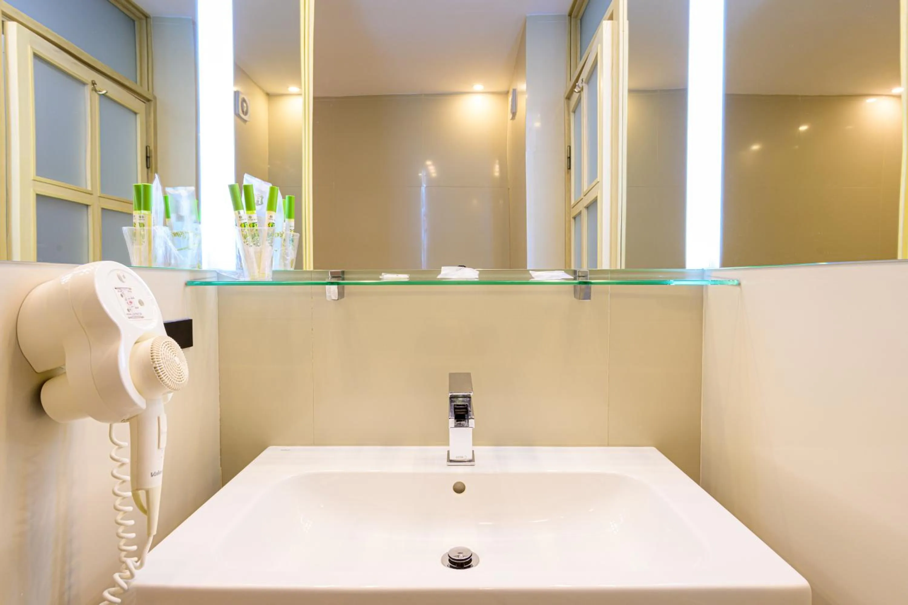 Bathroom in Hotel Christina Plus