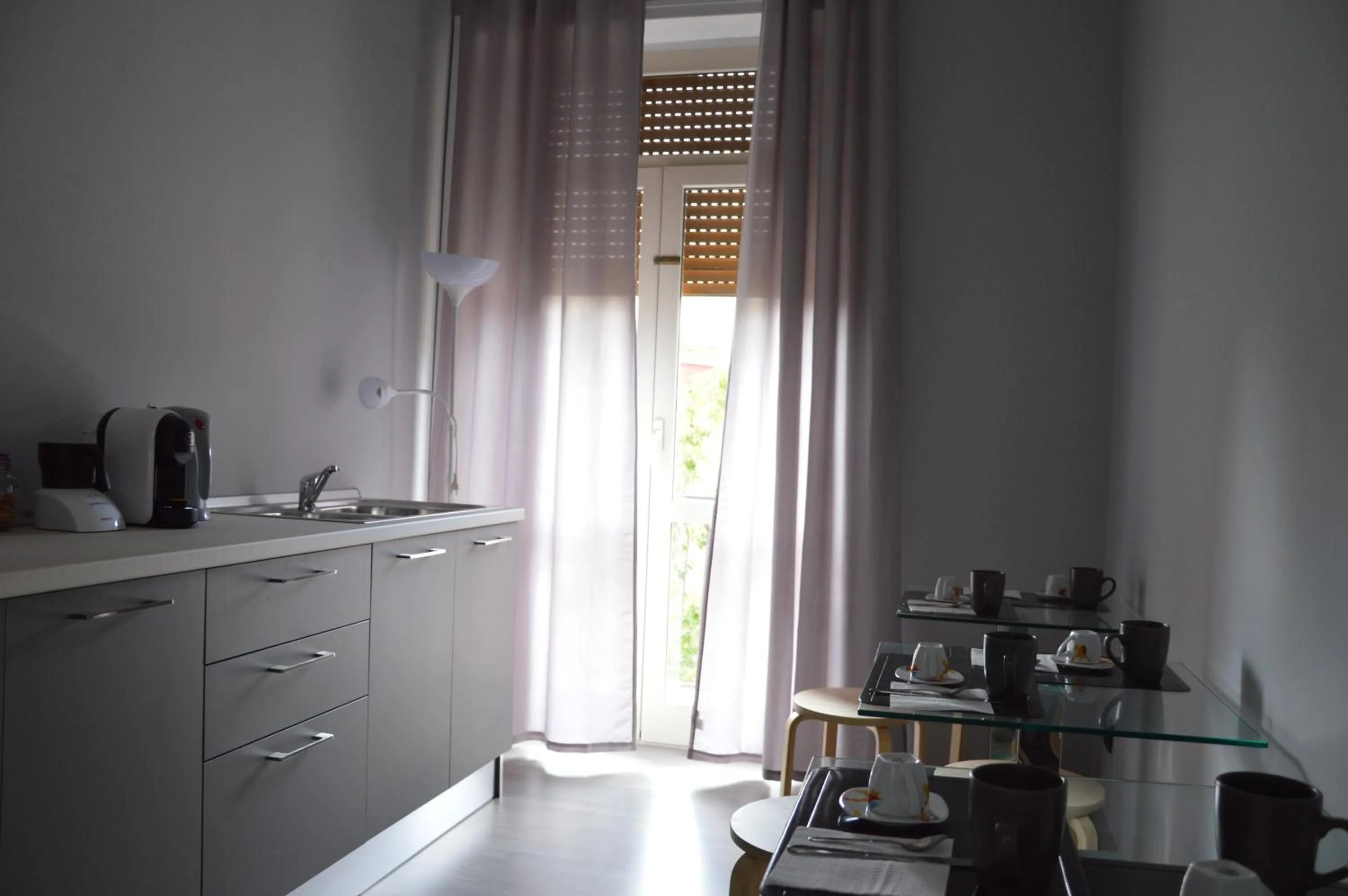 Communal lounge/ TV room in Iris Inn