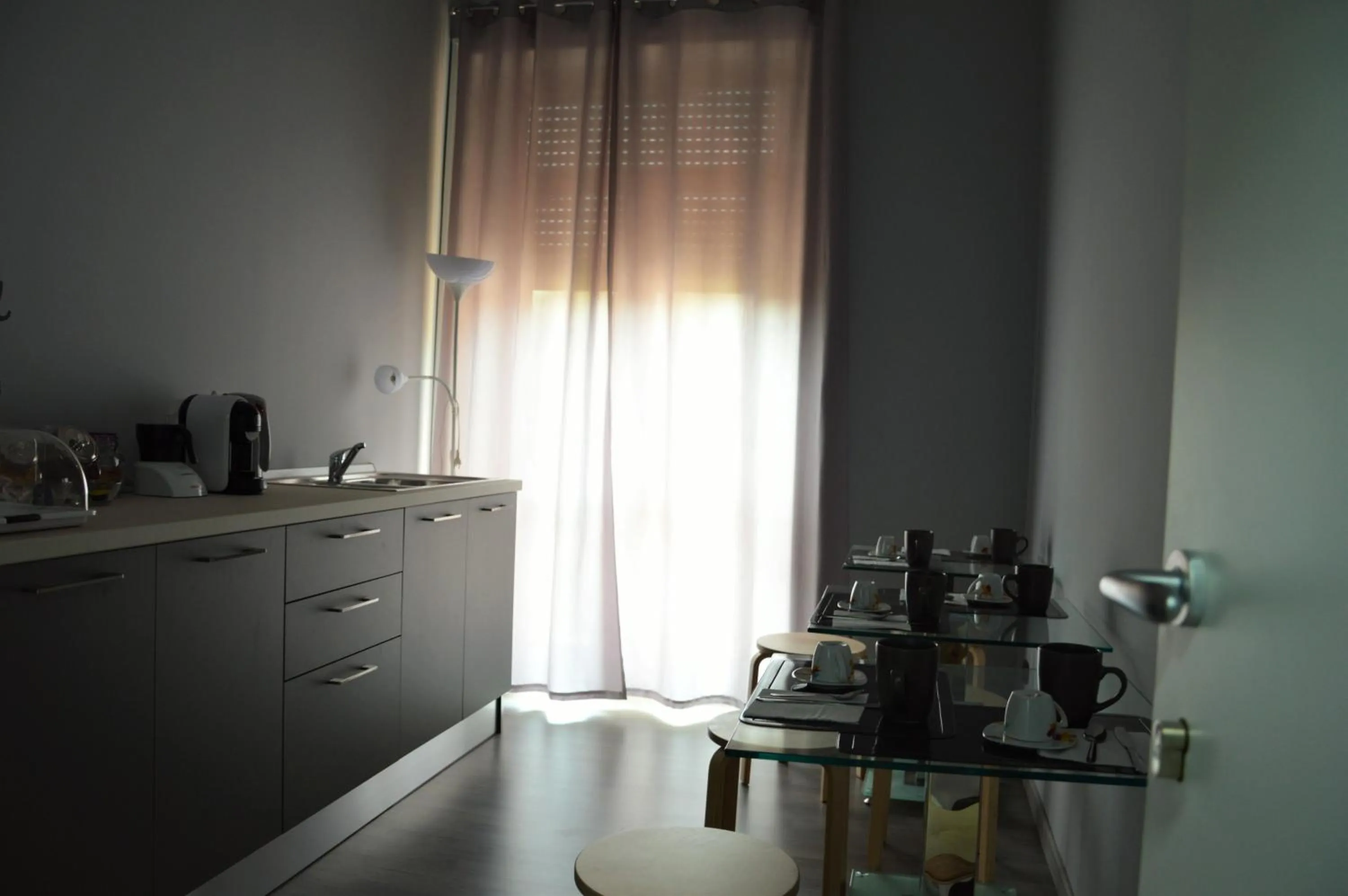 Communal lounge/ TV room in Iris Inn