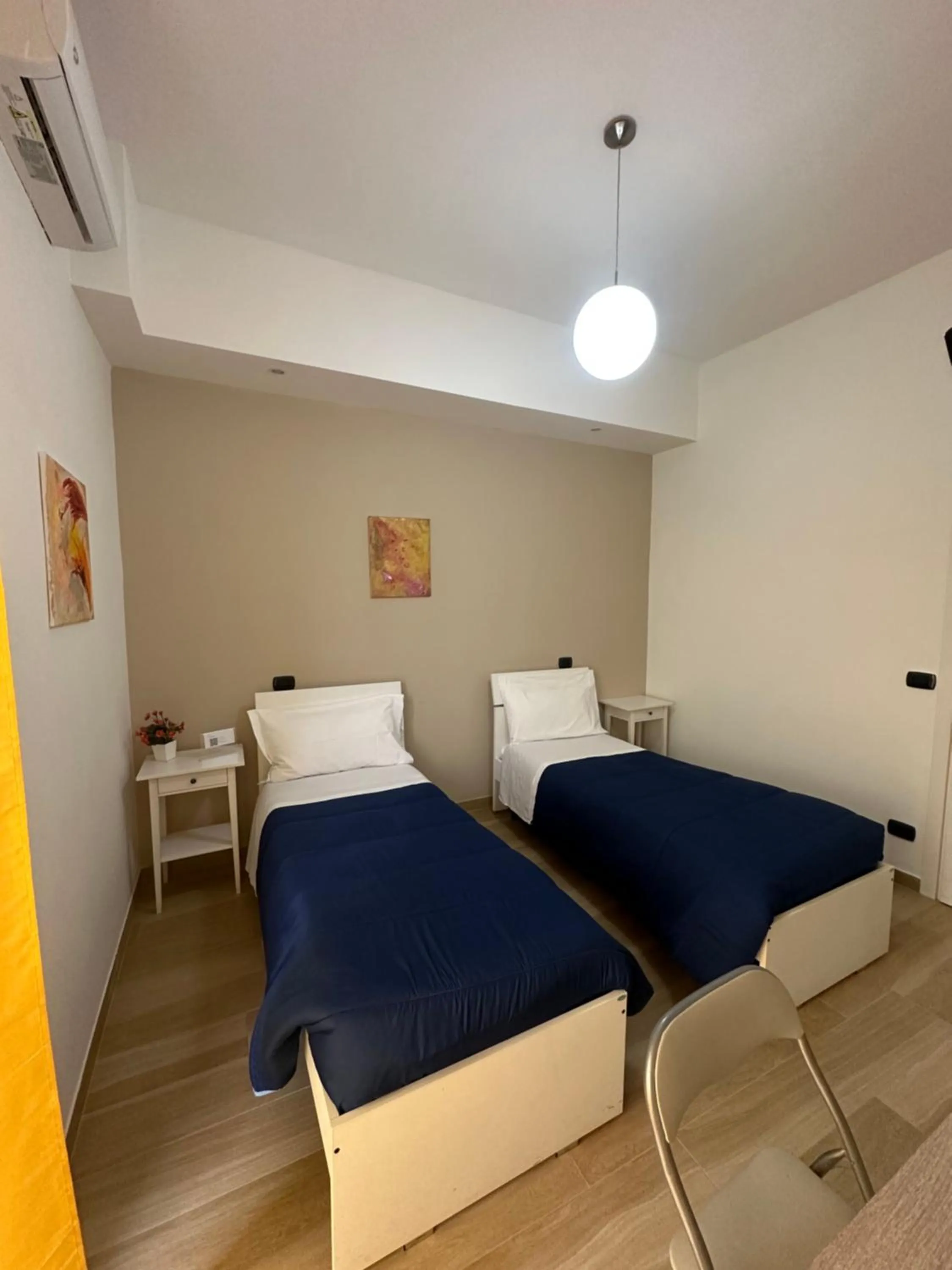 Photo of the whole room, Bed in Iris Inn