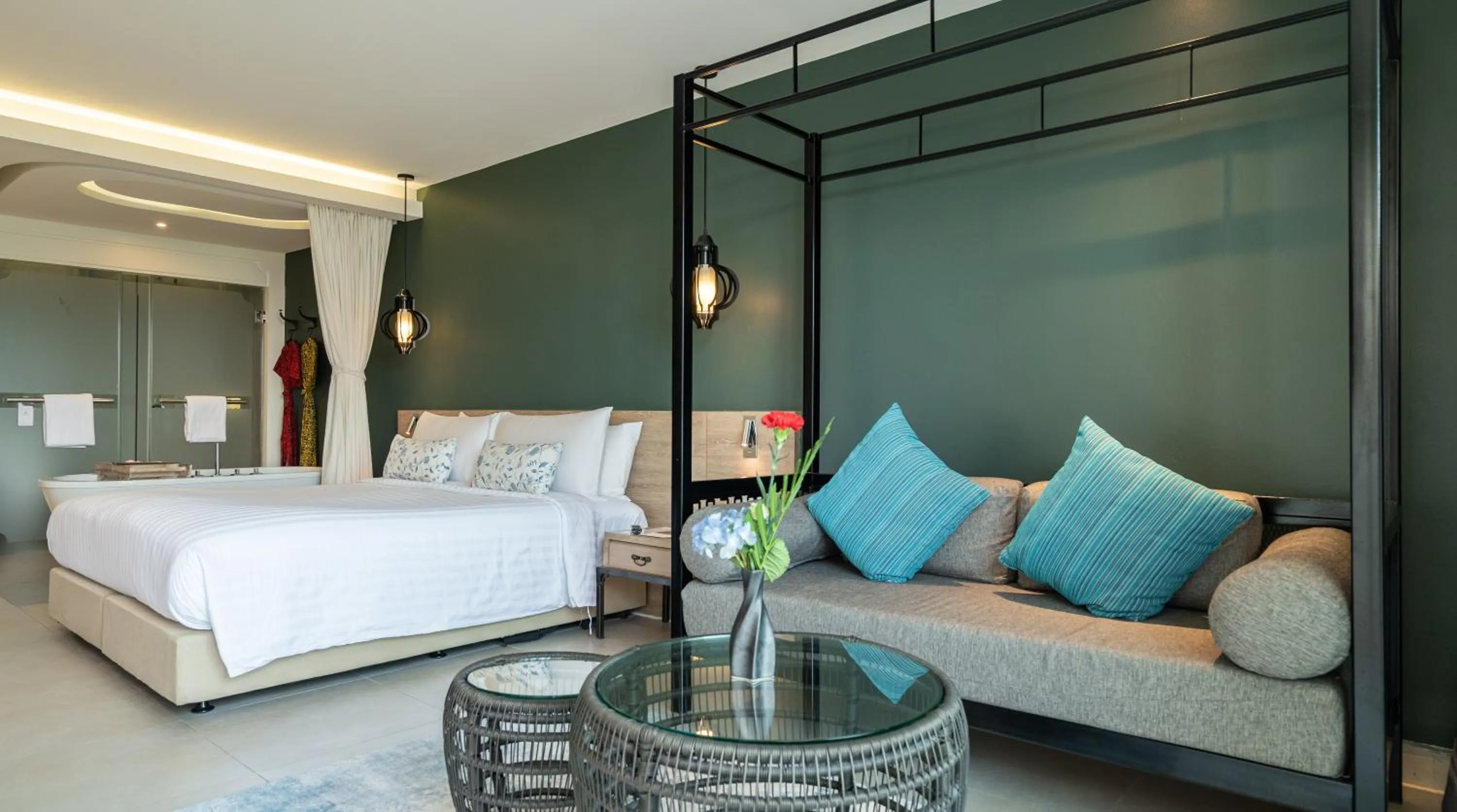 Seating area, Bed in Fusion Suites Phuket Patong