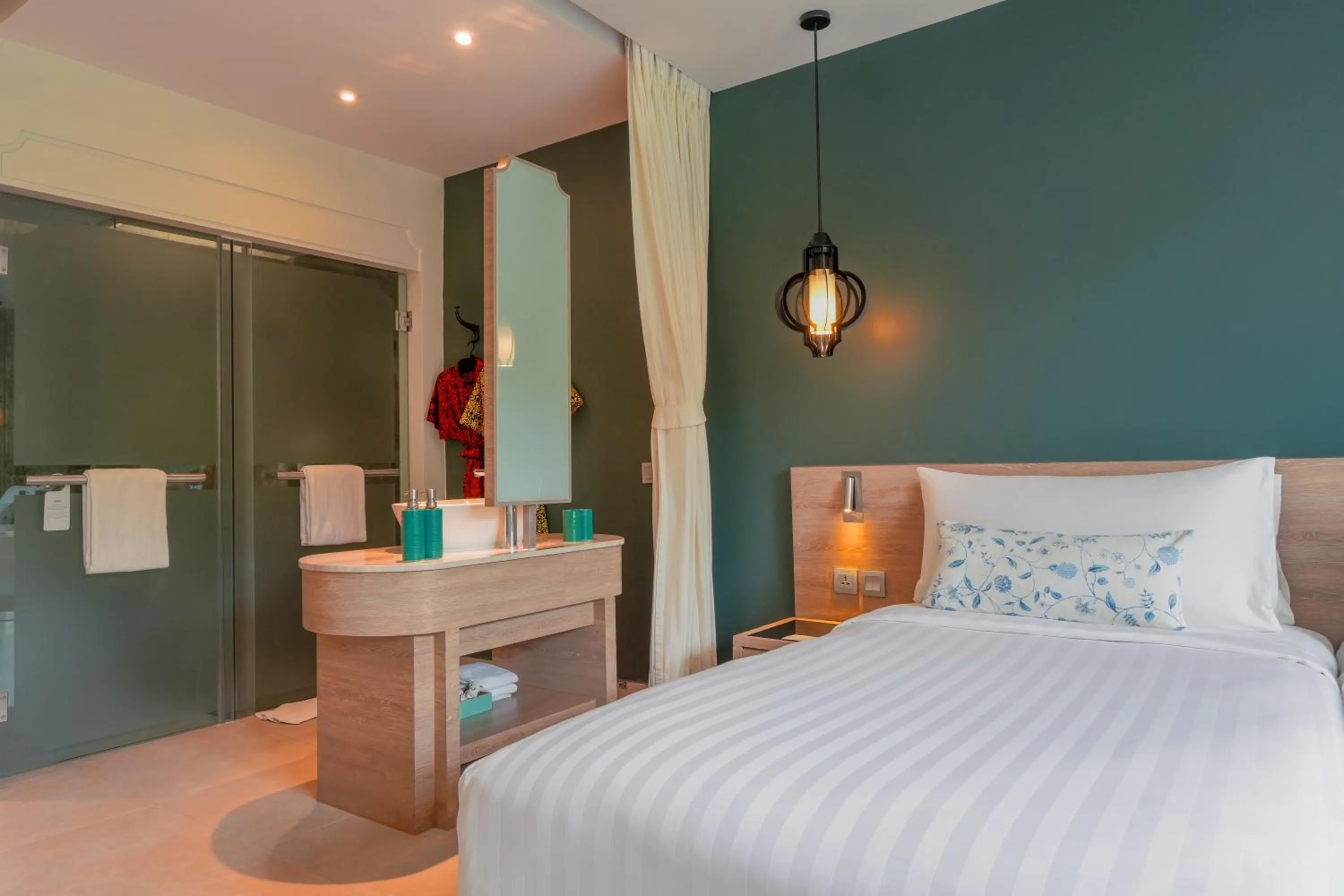 Bed in Fusion Suites Phuket Patong