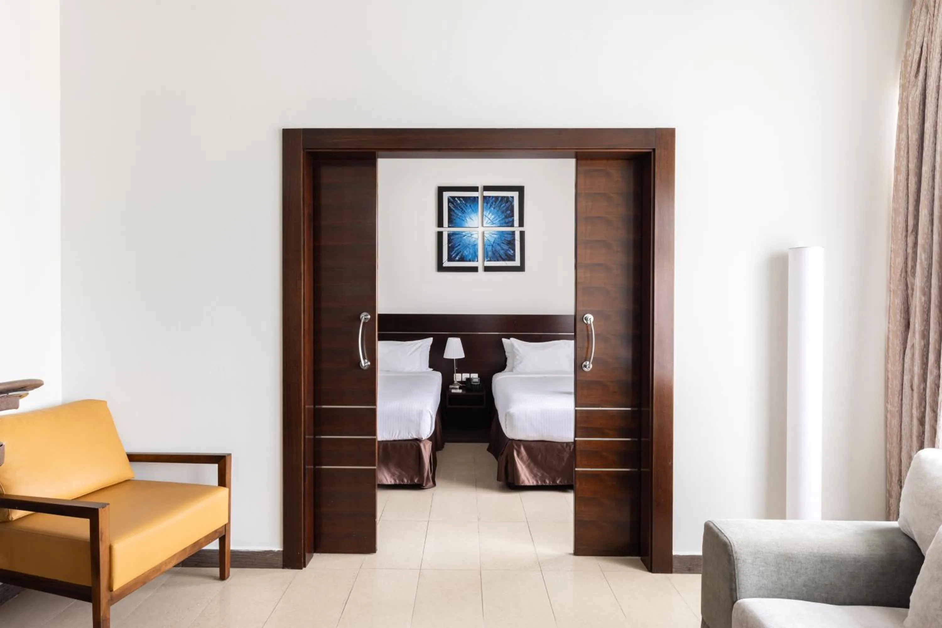 Bed in Palmeiras Suite Hotel