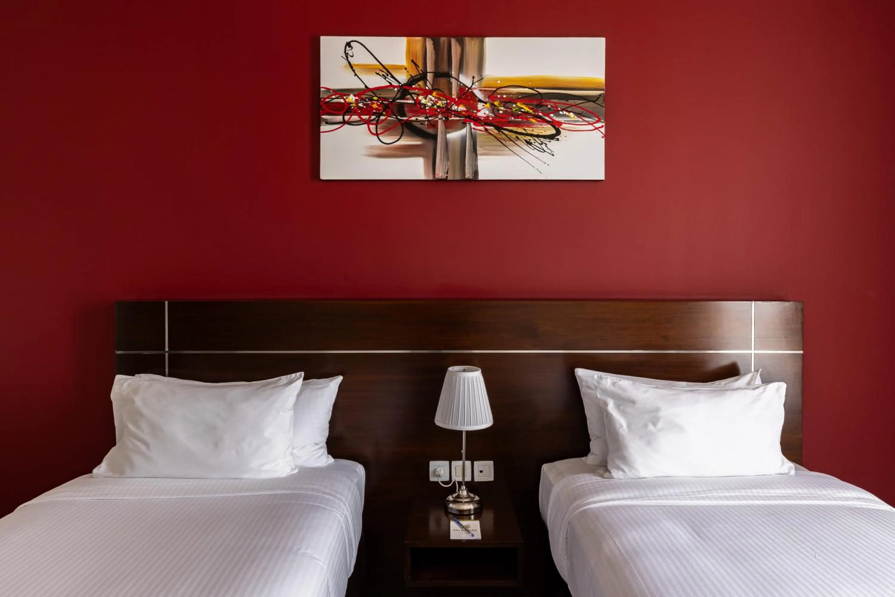 Bedroom in Palmeiras Suite Hotel