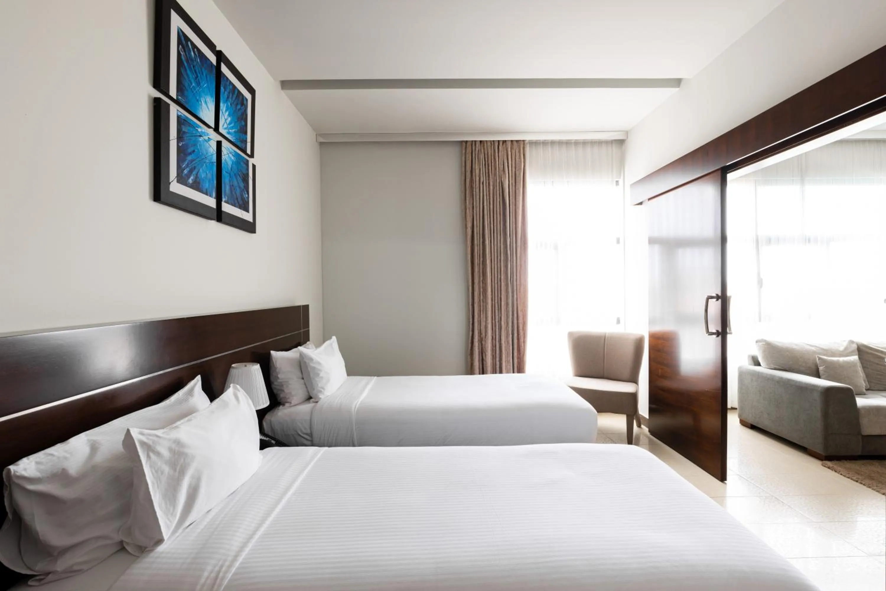 Bed in Palmeiras Suite Hotel