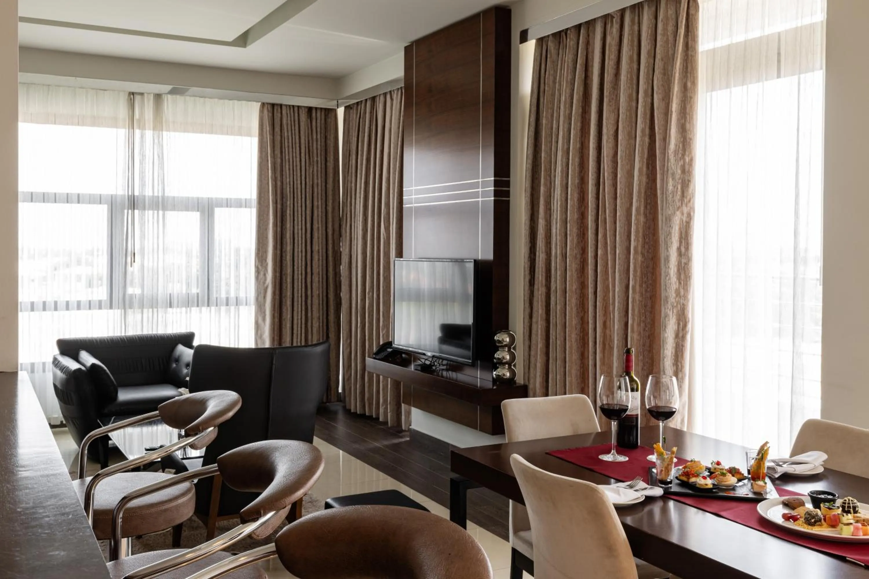 Living room in Palmeiras Suite Hotel