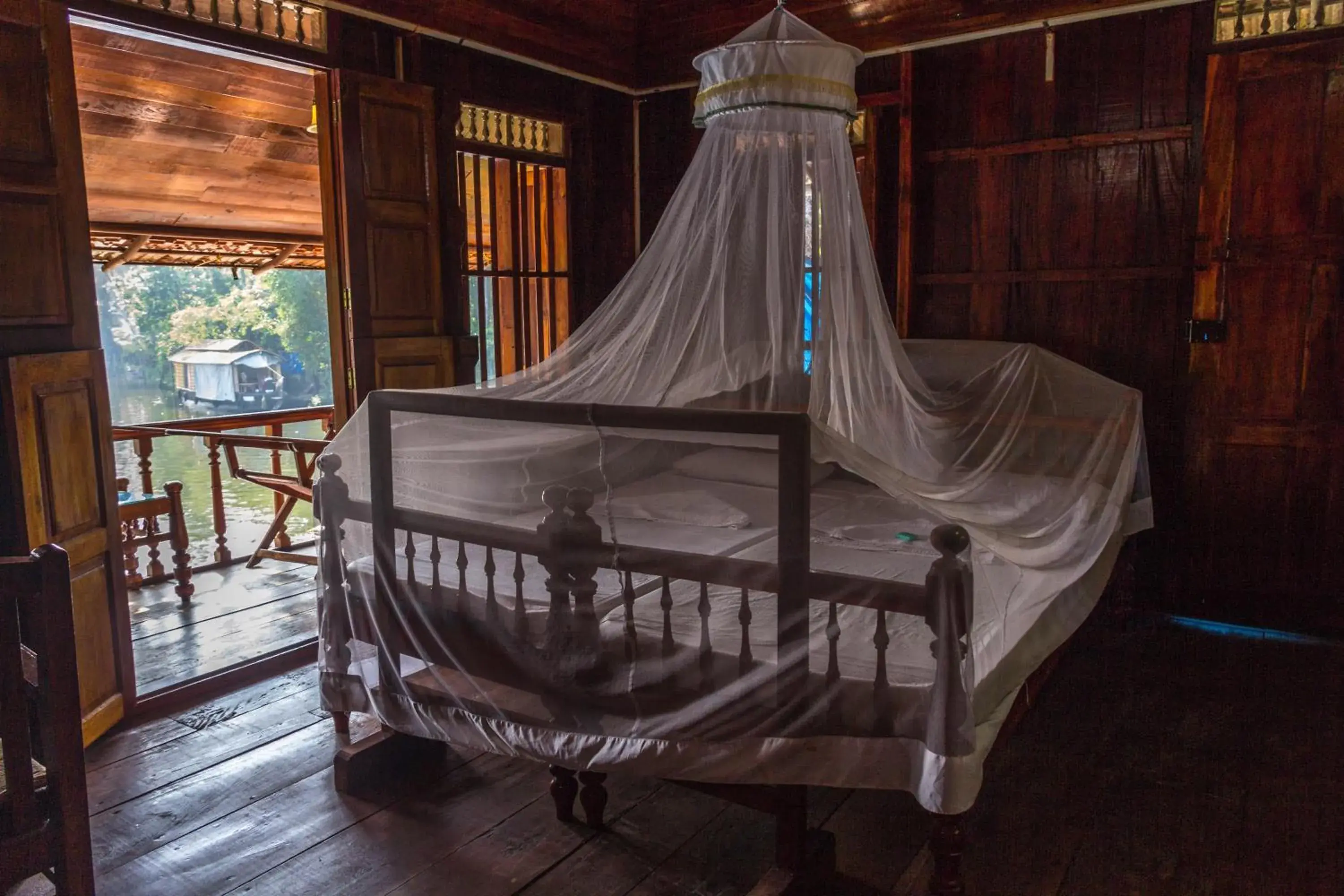 Upper Floor Wooden Room in Malayalam Lake Resort Upper Floor Wooden Room in Malayalam Lake Resort