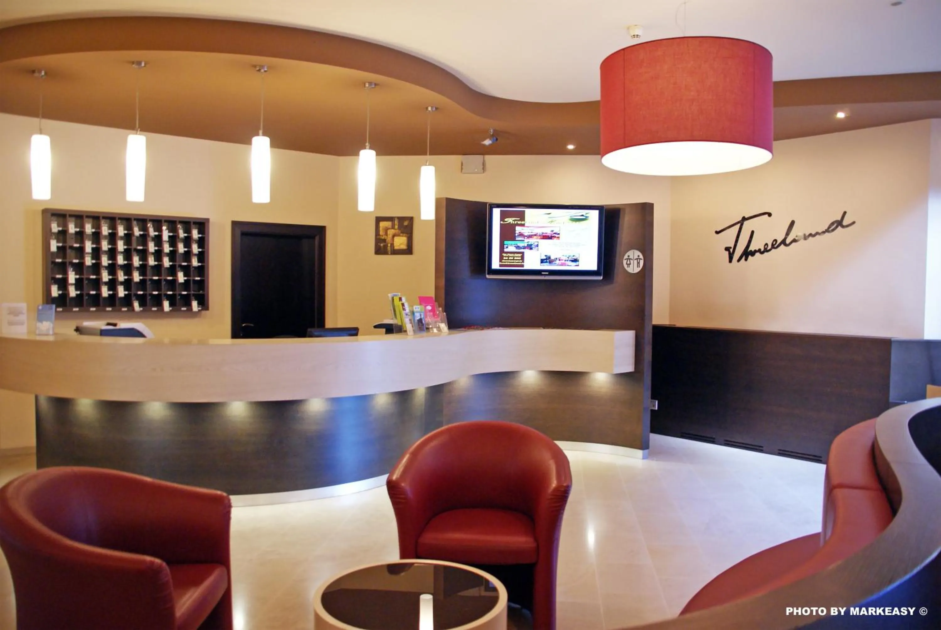 Lobby or reception in Threeland Hotel