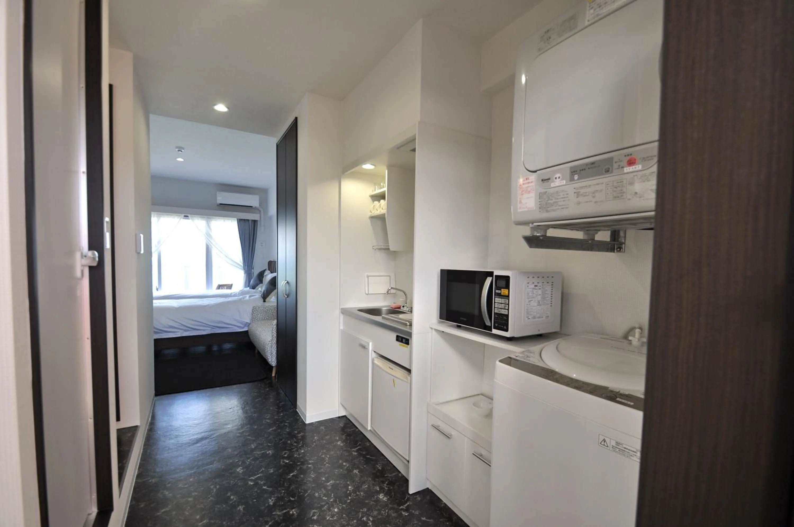 Kitchen or kitchenette in Beach Front Tower Mihama by DSH