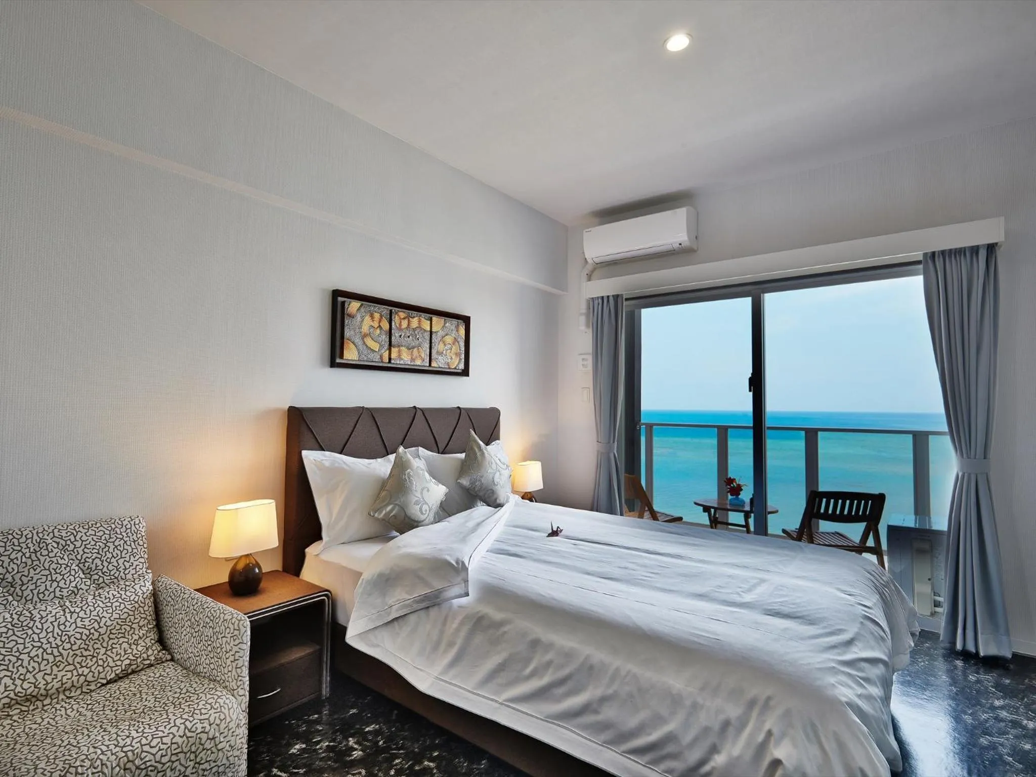 Photo of the whole room, Bed in Beach Front Tower Mihama by DSH