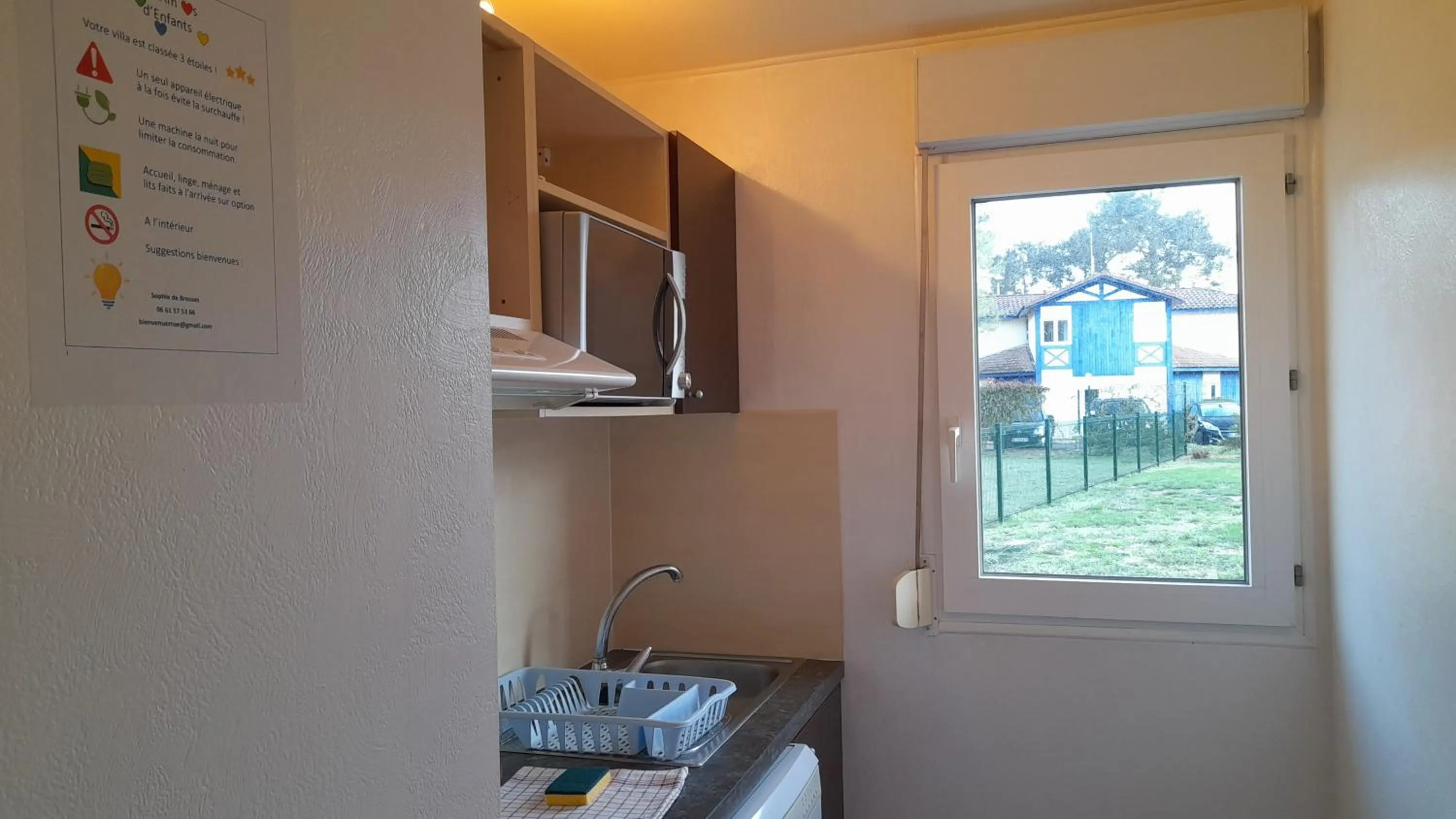 Kitchen or kitchenette in Résidence Mes Amours d'Enfants - Les Villas du Lac