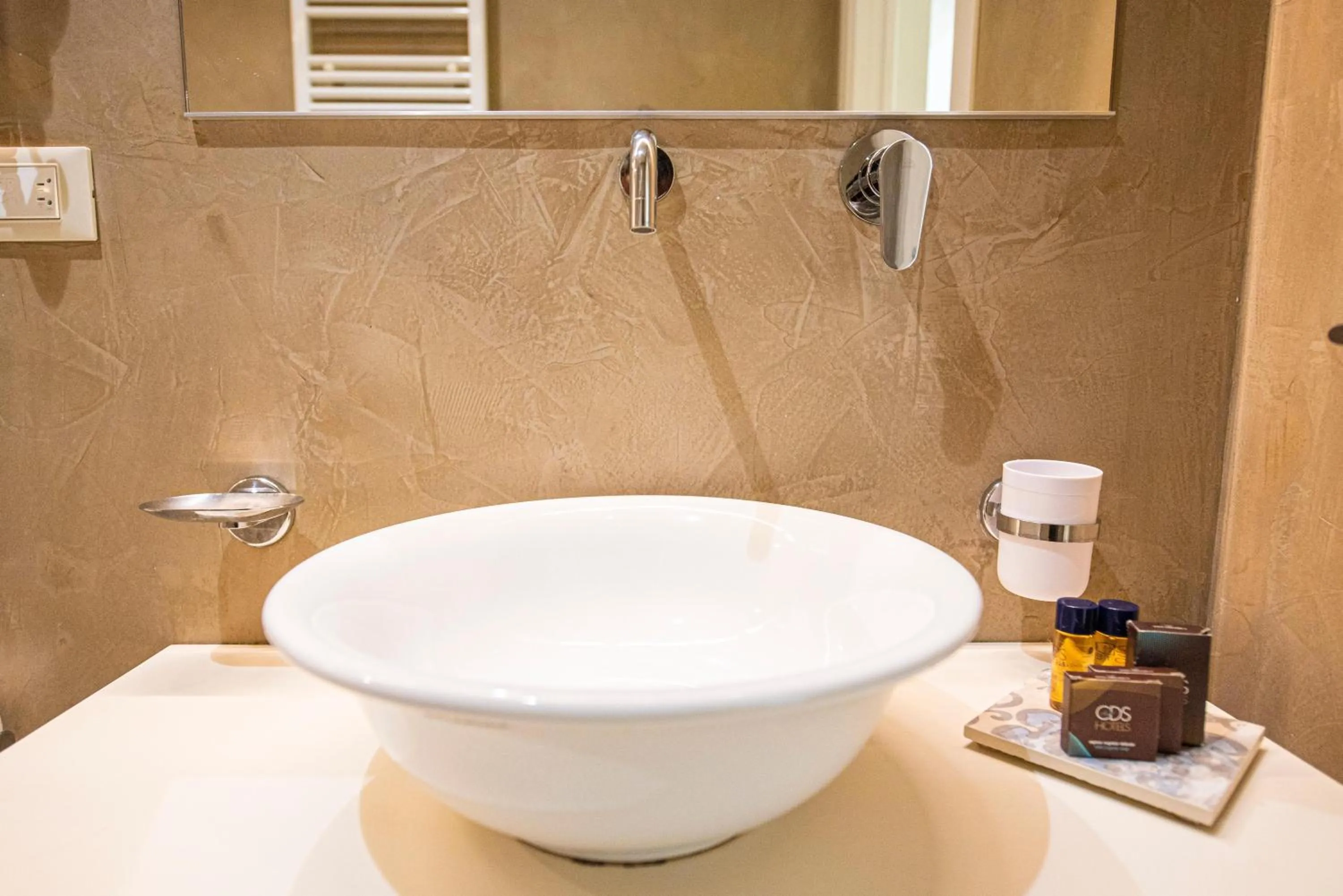 Bathroom in Relais Masseria Le Cesine - CDSHotels