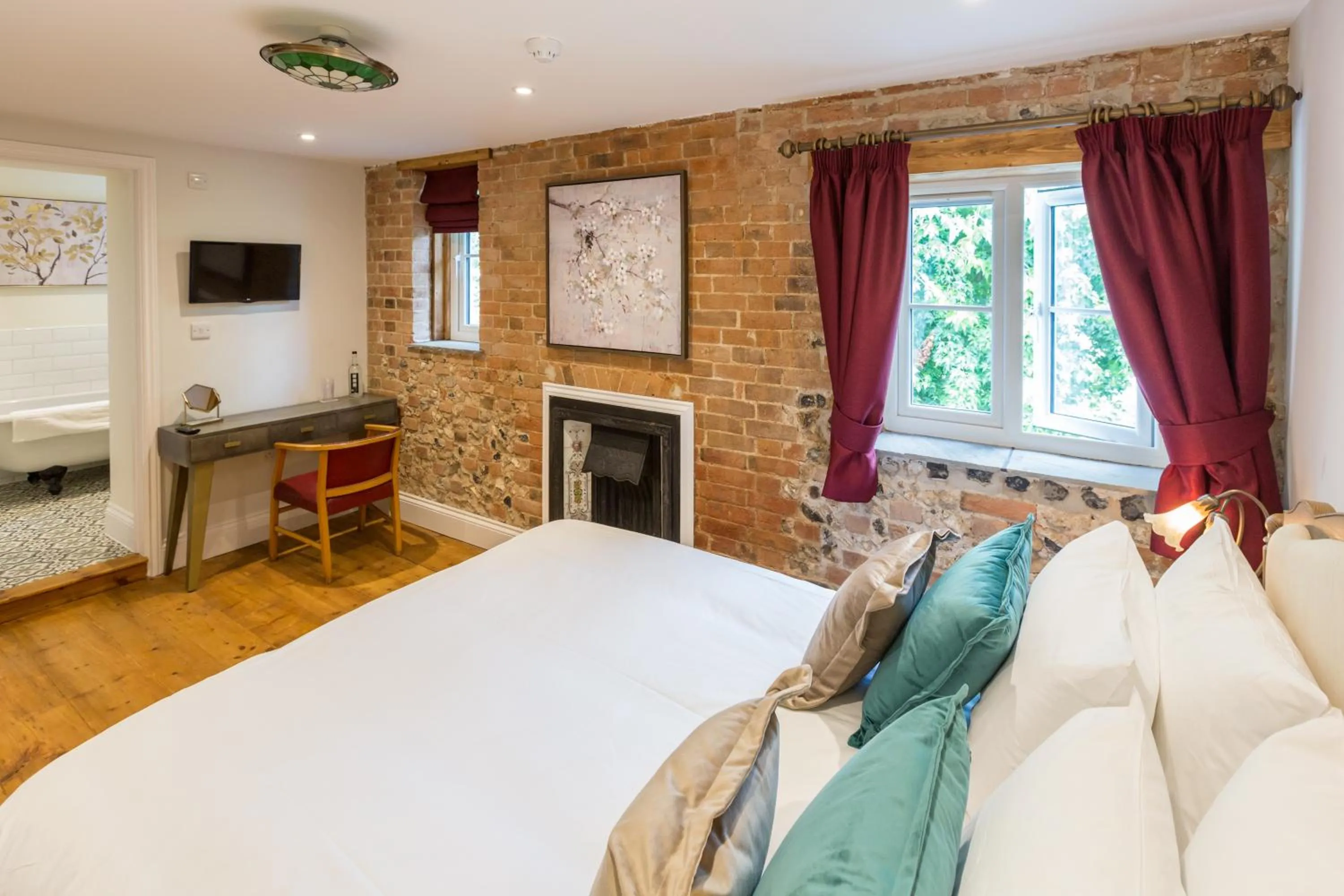 Bed in The Dog & Gun Inn