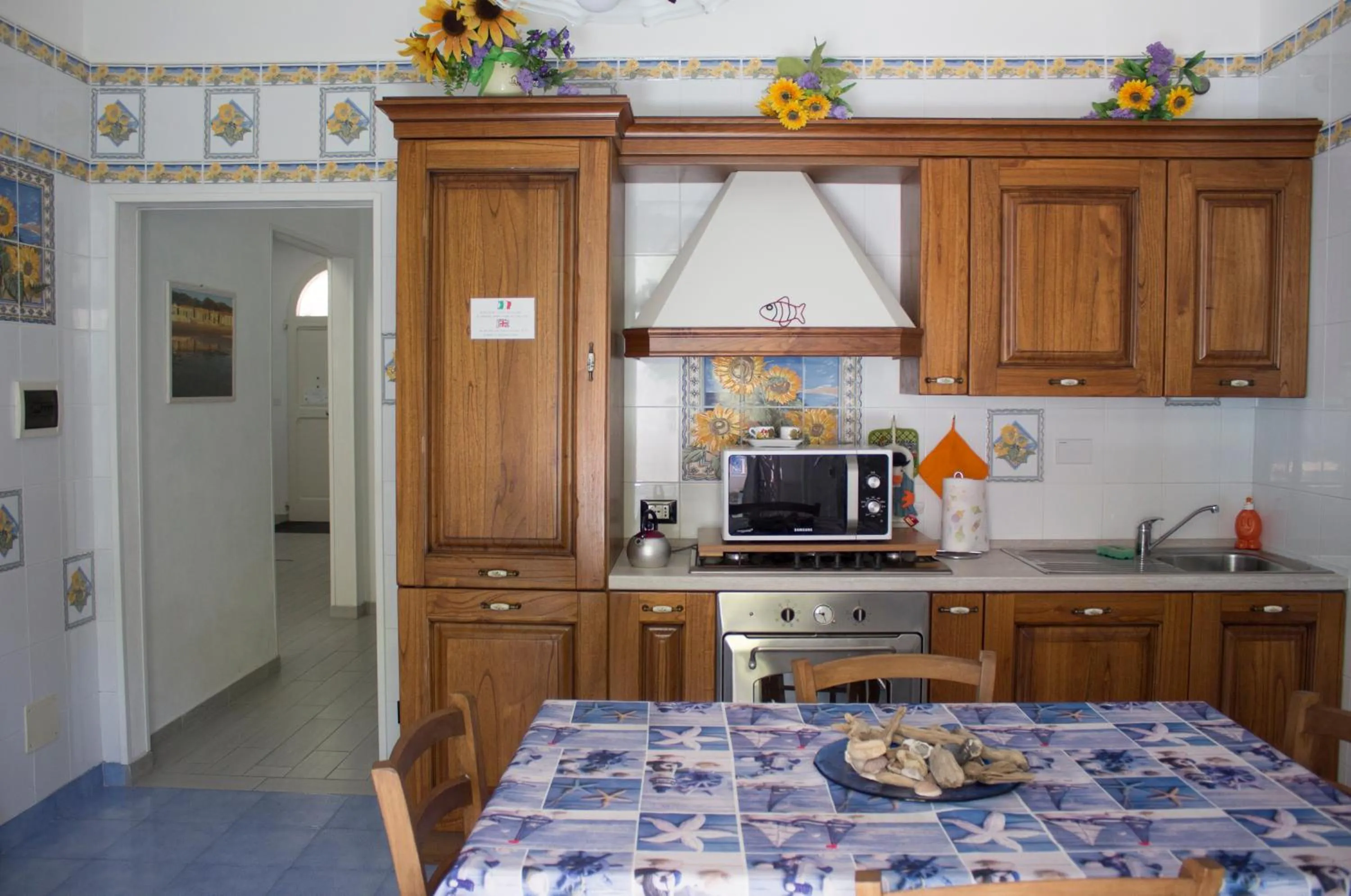 Kitchen or kitchenette in La Casa di Bianca