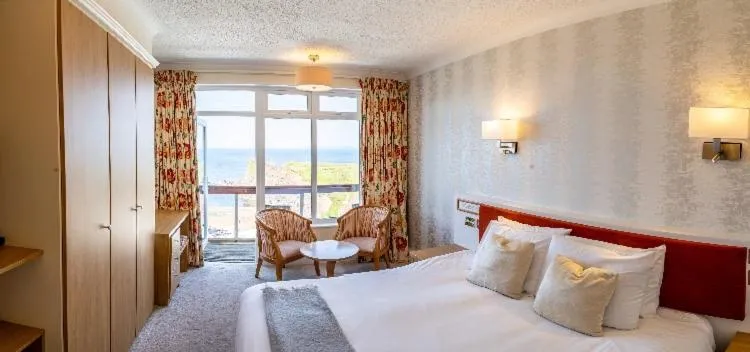 Bed in The Cottage Hotel